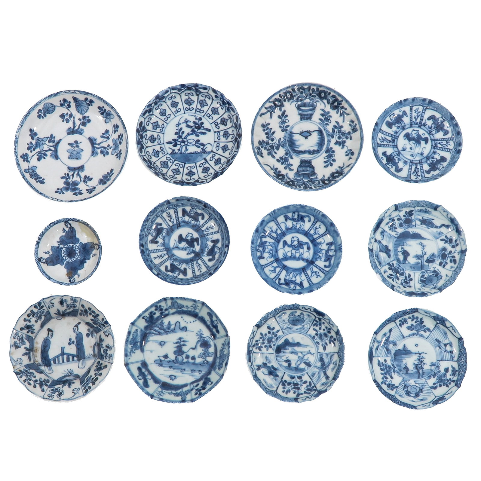 A Group of Blue and White Saucers: In a variety of decors and sizes, including 18th Century, largest saucer is 13 cm. in diameter, in diverse conditions.