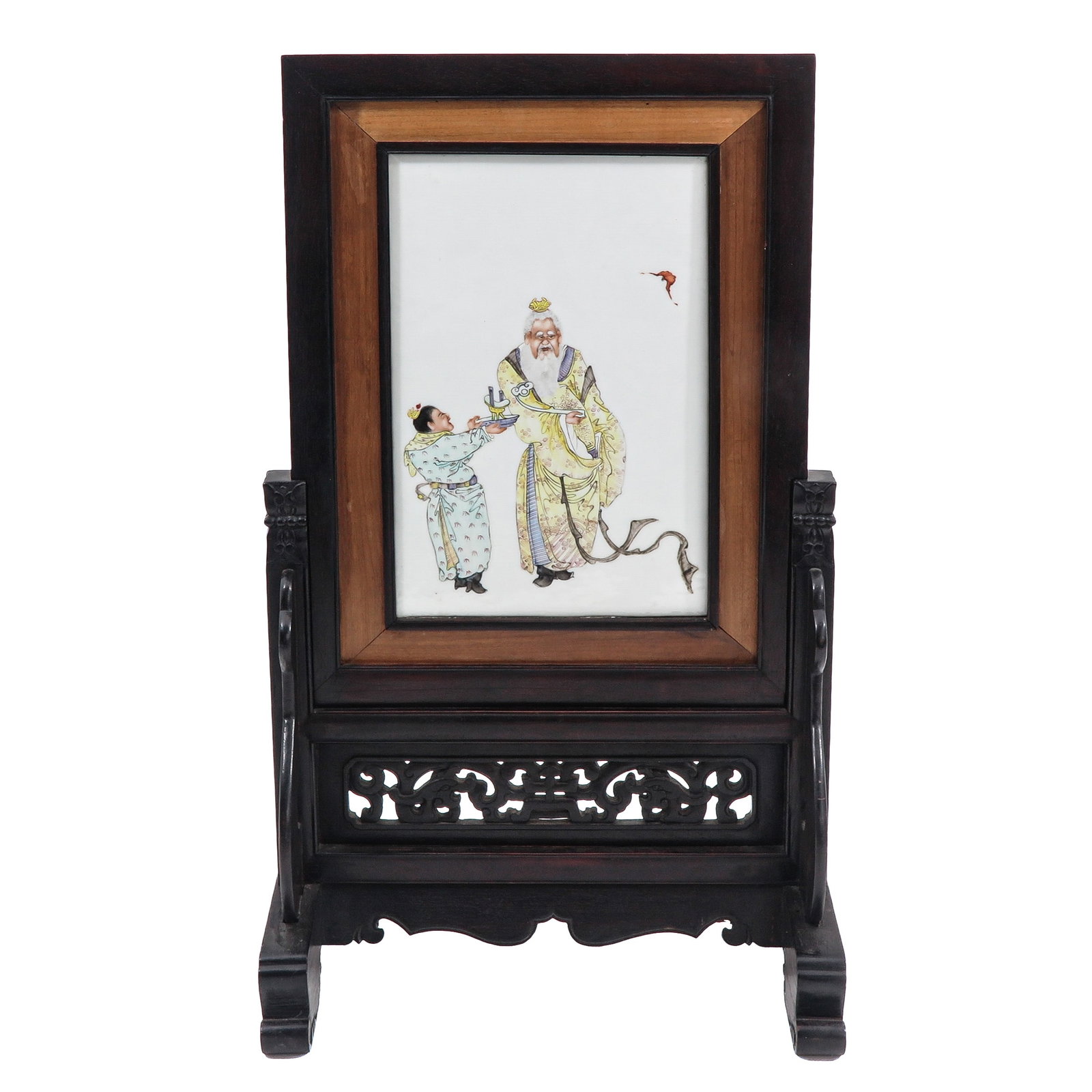 A Framed Famille Rose Chinese Table Tile: Depicting a Chinese immortal with child, in a beautifully carved frame, tile measures 27 x 39 cm.