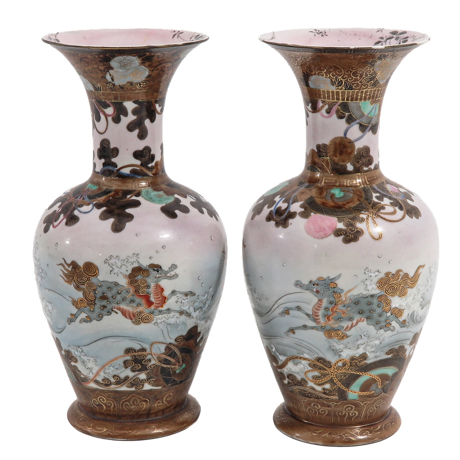 A Pair of Kutani Vases: Decorated with kirin amidst crashing waves and auspicious objects in gilt and polychrome enamels, 30 cm. tall, hairline.