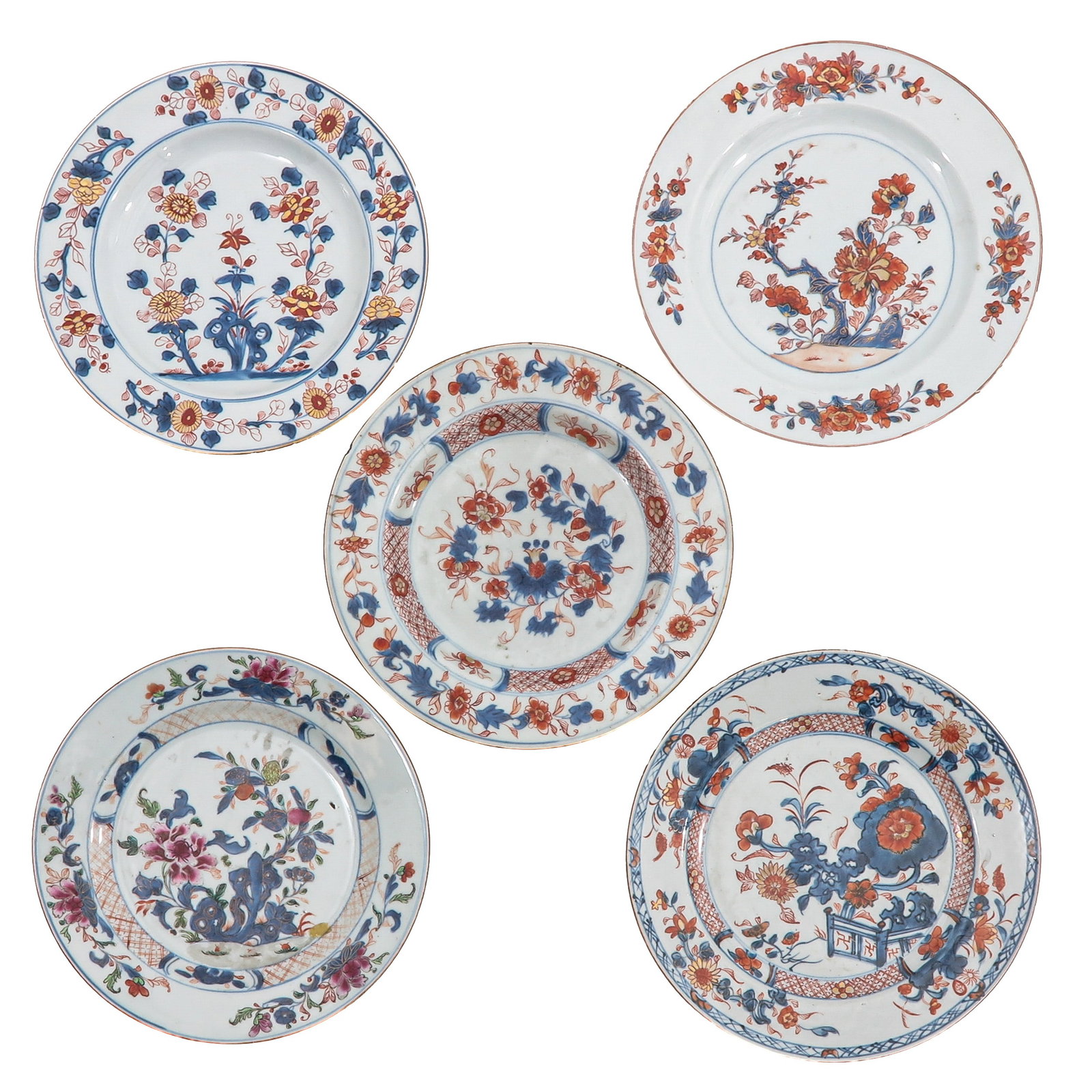 A Group of 5 Imari Plates: Each decorated with floral motifs in underglaze blue and iron red enamels, 18th Century, 23 cm. in diameter, chip and hairline.