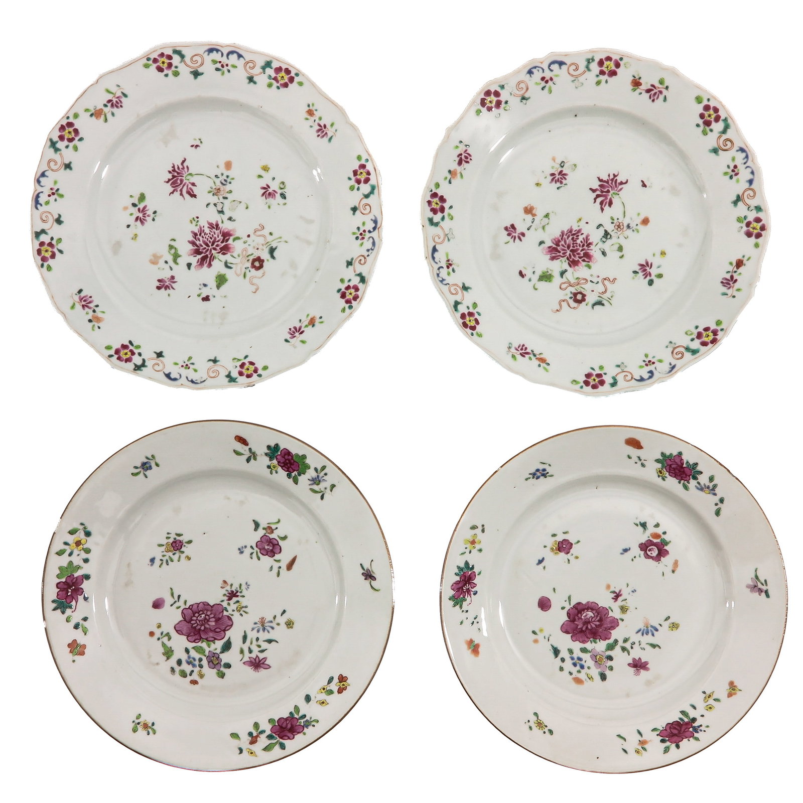 A Lot of 2 Pair of Famille Rose Plates: Depicting scattered floral sprays, 18th Century, 23 cm. in diameter, hairline.