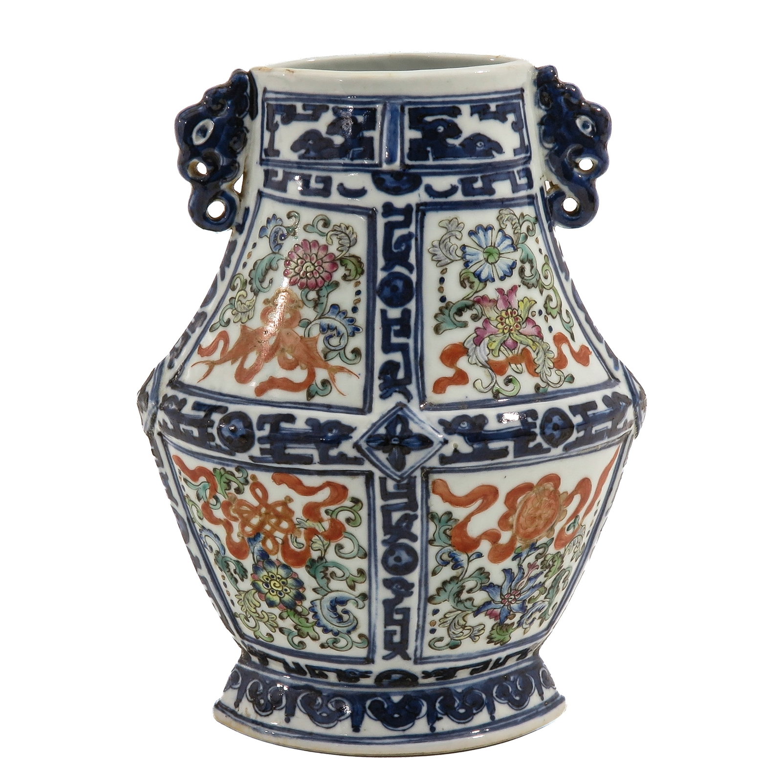 A Polychrome Decor Vase: Decorated in underglaze blue and polychrome enamels with floral auspicious motifs, with pierced handles, 21 cm. tall, restoration on handle.