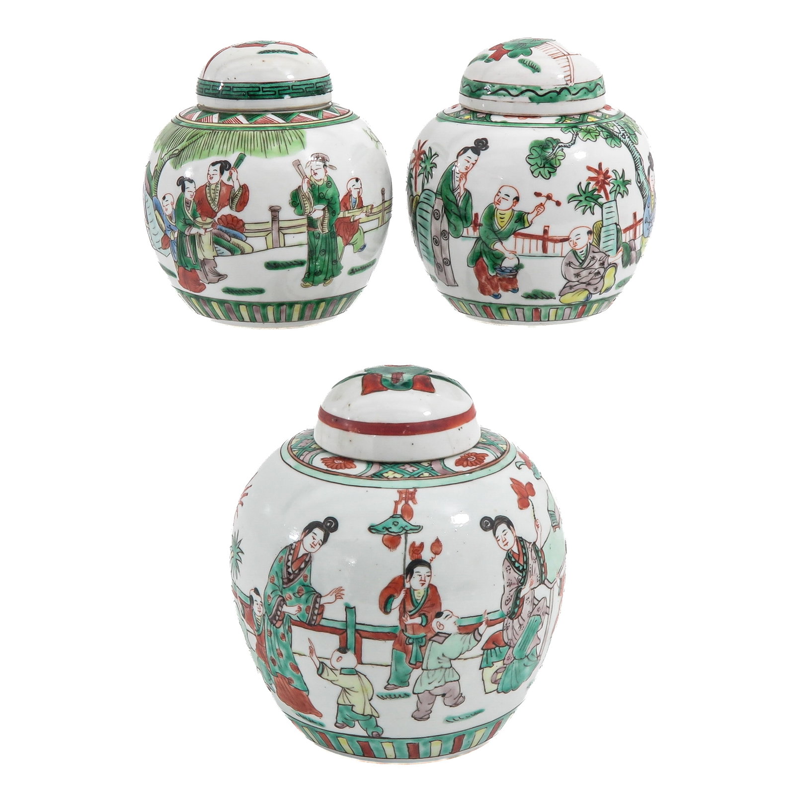 A Group of 3 Famille Verte Covered Ginger Jars: Decorated with court ladies and boys at play in garden landscapes, 19th Century, tallest jar is 19 cm., hairline.