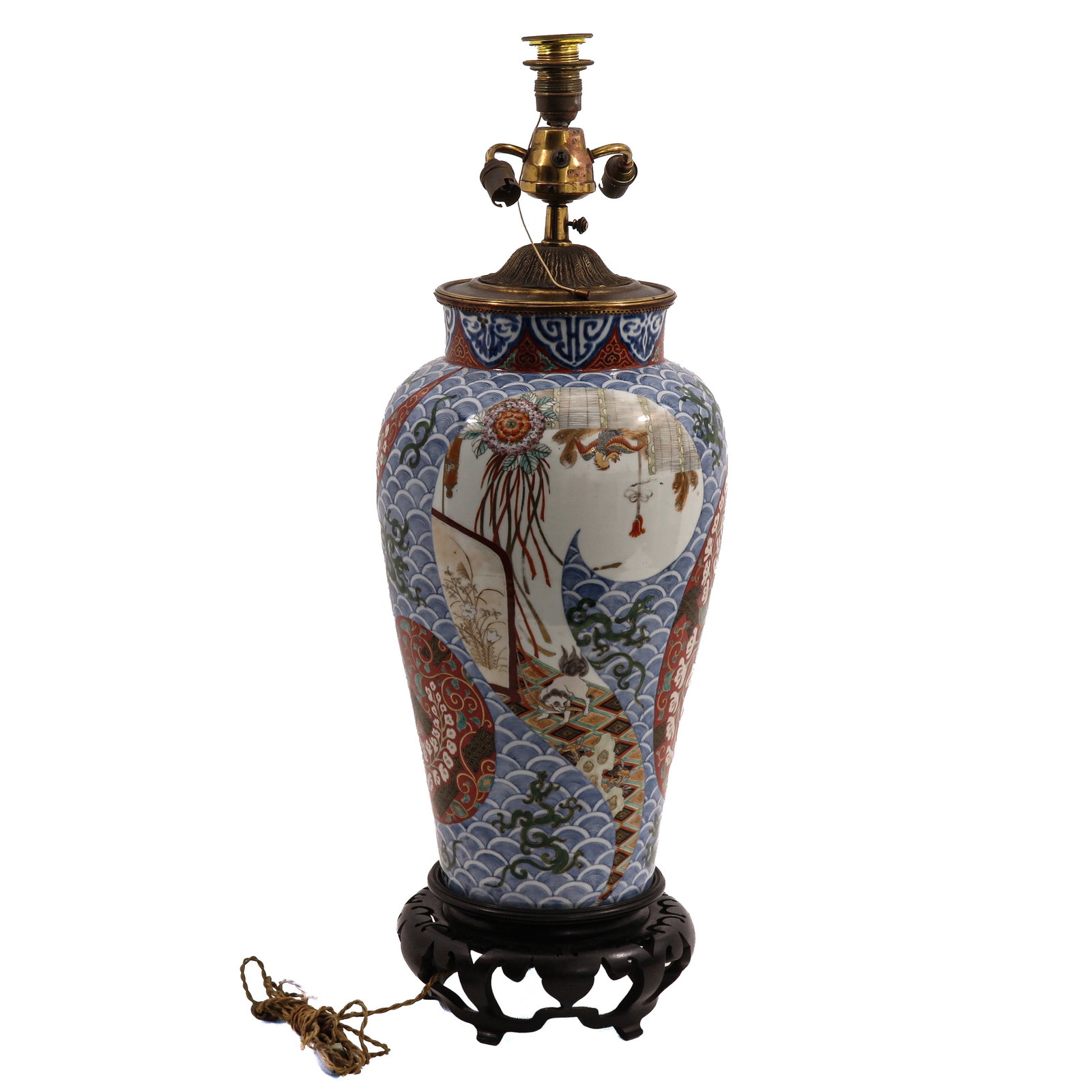 A Table Lamp: made from a Japanese Imari porcelain baluster vase, with bronze mounts and a wood base, 80 cm. tall.