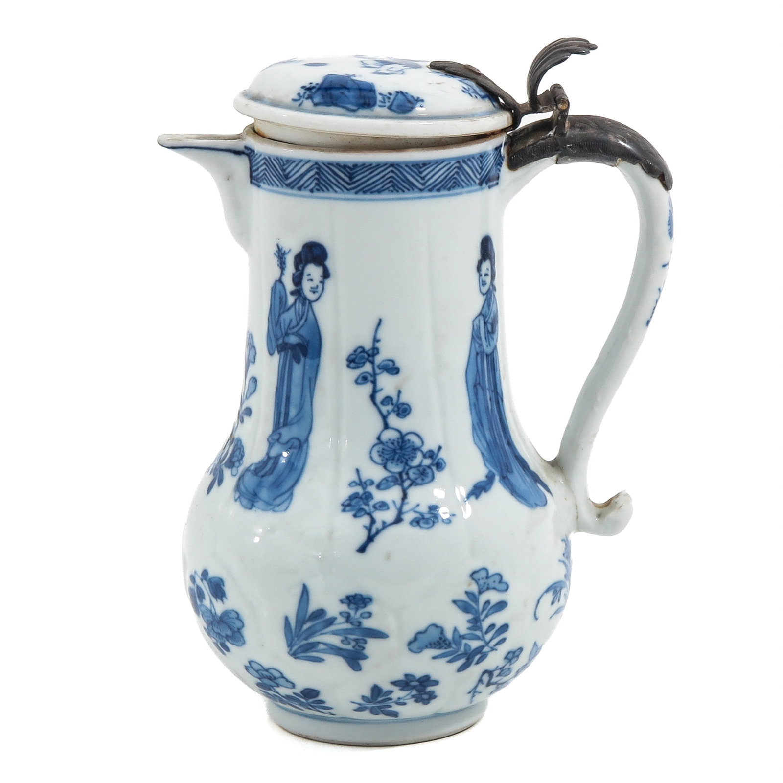 A Blue and White Creamer: Depicting alternating scenes with ladies and flowers, with silver fittings, 18th Century, 14 cm. tall, with restoration.