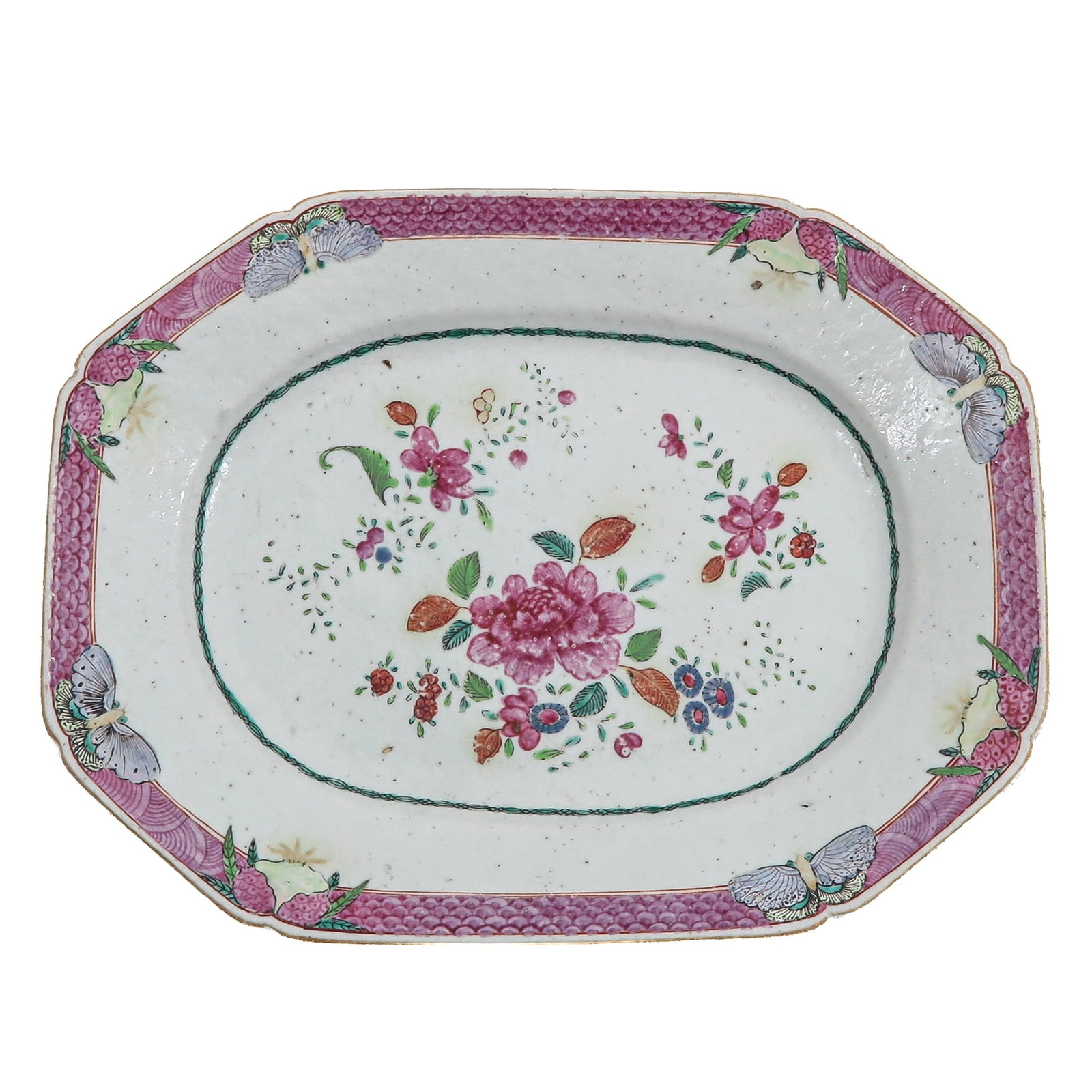 A Famille Rose Octagonal Platter: Decorated with a central floral spray within a border of butterflies and fruit, ca. 1800, 32 x 25 cm.