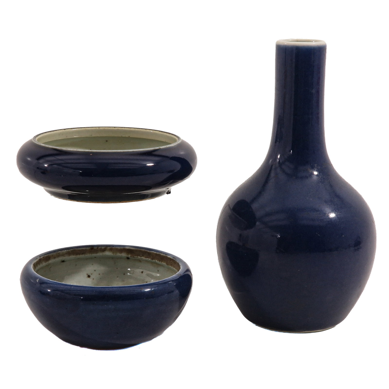 A Group of Monochrome Blue Glazed Porcelain: Including a bottle vase and 2 brush washers, vase is 21 cm. tall, hairline.