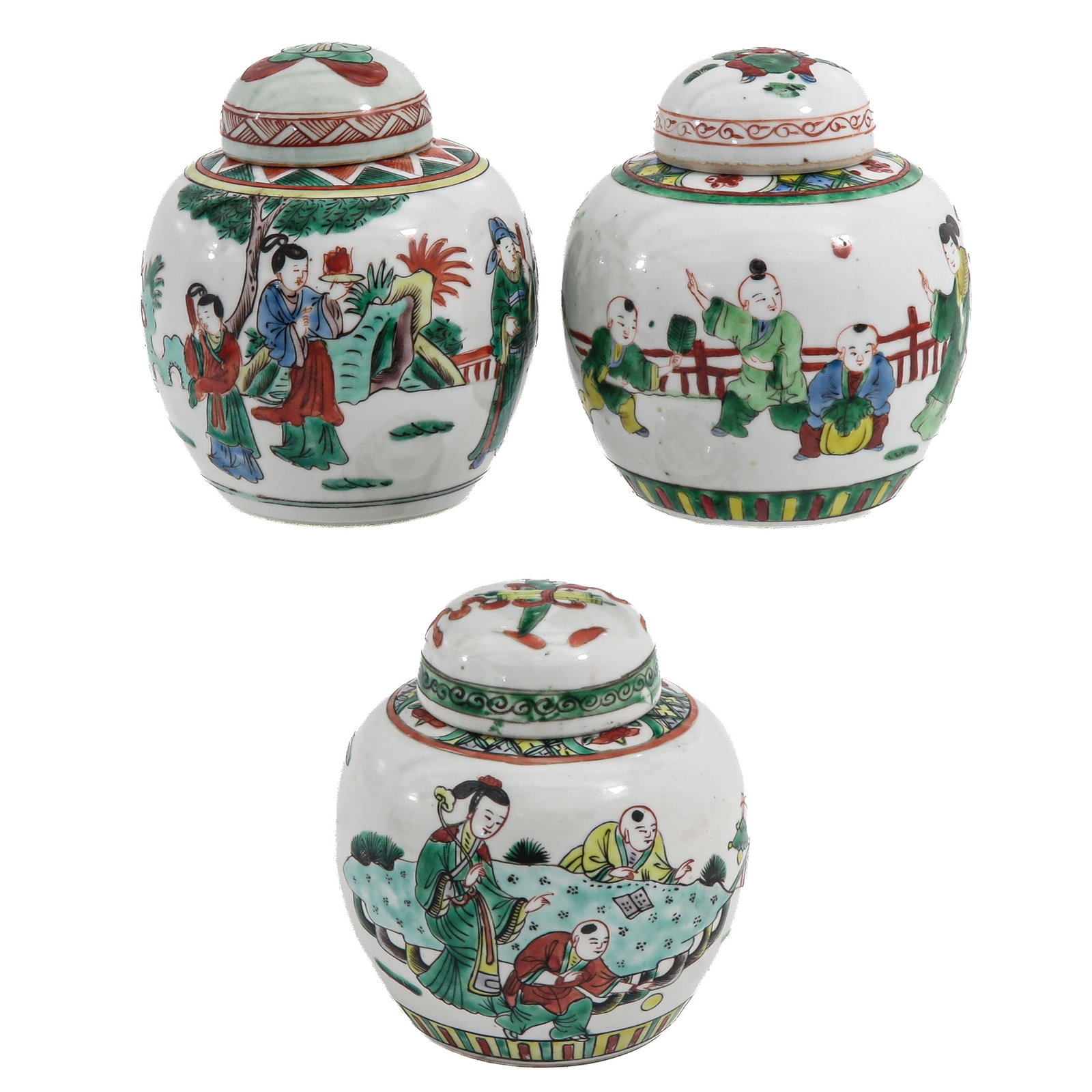 A Group of 3 Famille Verte Covered Ginger Jars: Decorated with court ladies and boys at play in garden landscapes, 19th Century, 15 cm. tall.