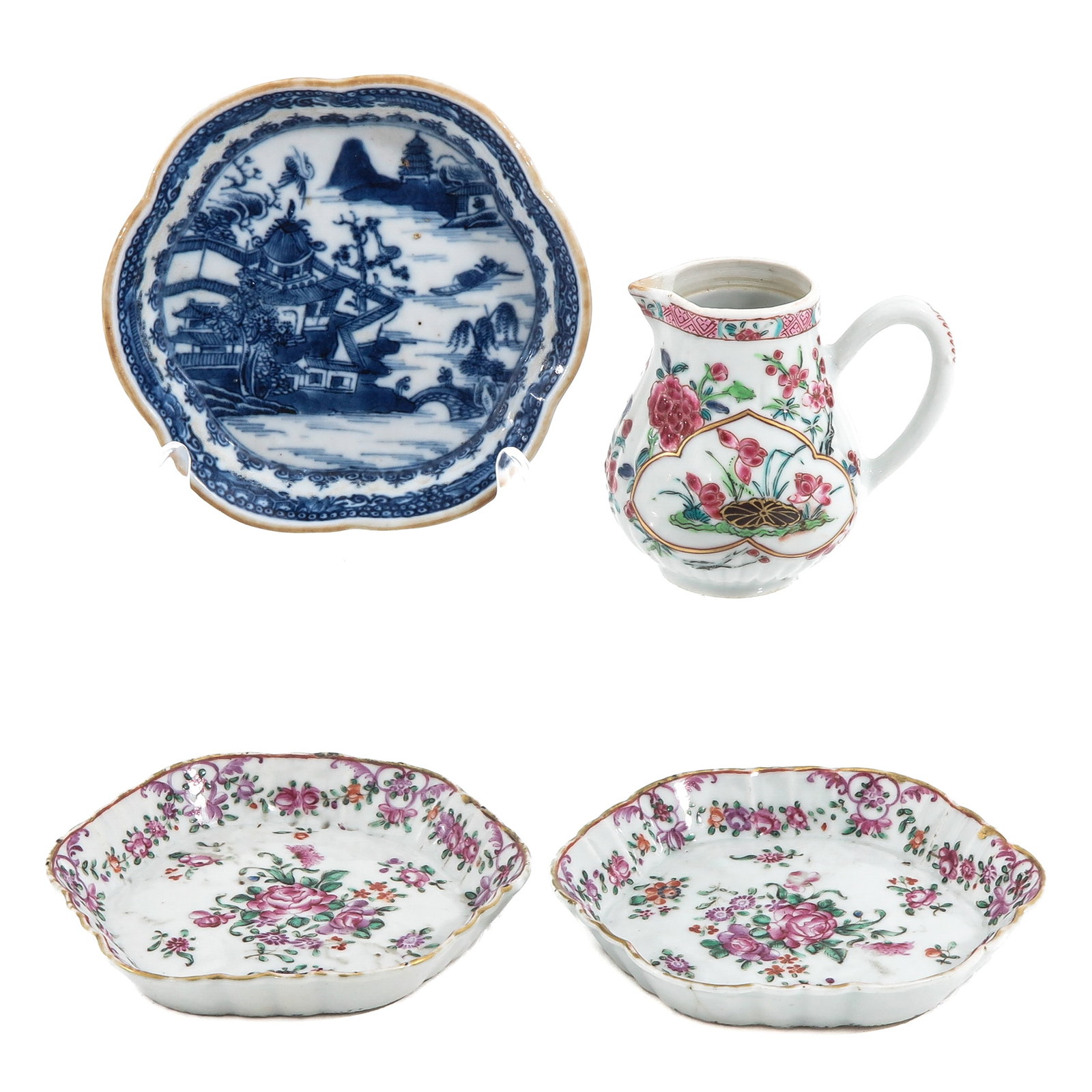 A Group of Porcelain: Including a creamer and 3 small trays, in Famille Rose and Blue and White decors, including 18th Century, creamer is 8 cm. tall, chip and hairline.