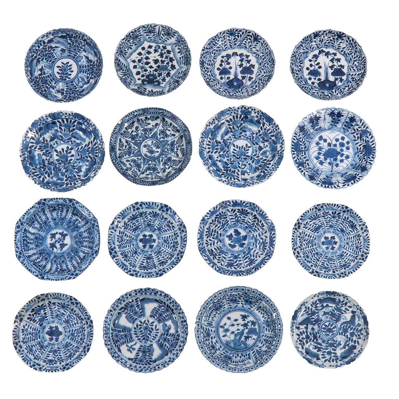 A Group of Blue and White Saucers: In a variety of blue and white decors, including 18th Century, largest saucer is 13 cm. in diameter, in diverse conditions.