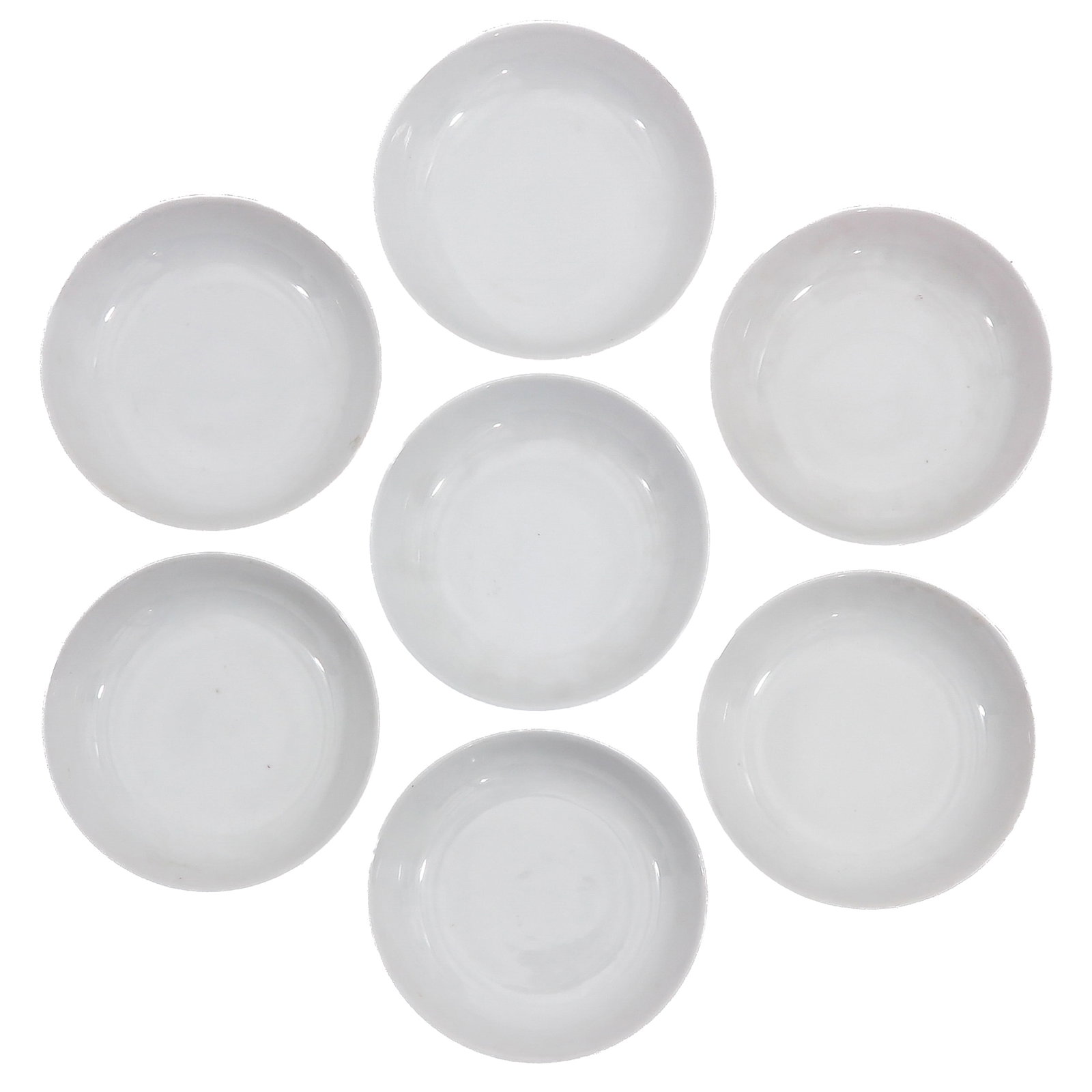 A Group of 7 Ruby Back Dishes: White glaze, 14 cm. in diameter.