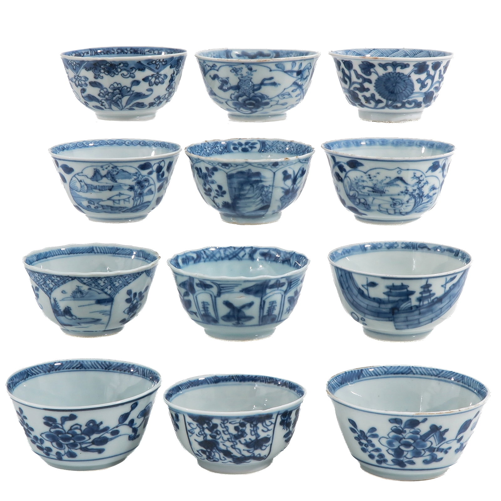 A Group of Blue and White Cups: Variously decorated with floral motifs and landscape scenes, including 18th Century, largest cup is 9 cm. in diameter, chip and hairline.