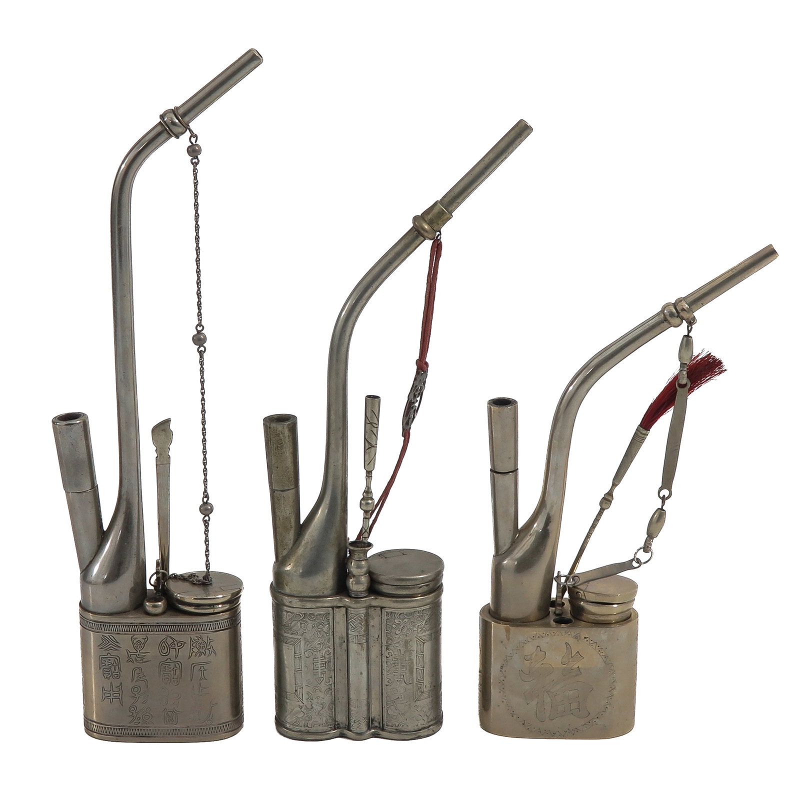 A Group of 3 Opium Pipes: With engraved metal reservoirs and attached implements, tallest pipe is 31 cm.