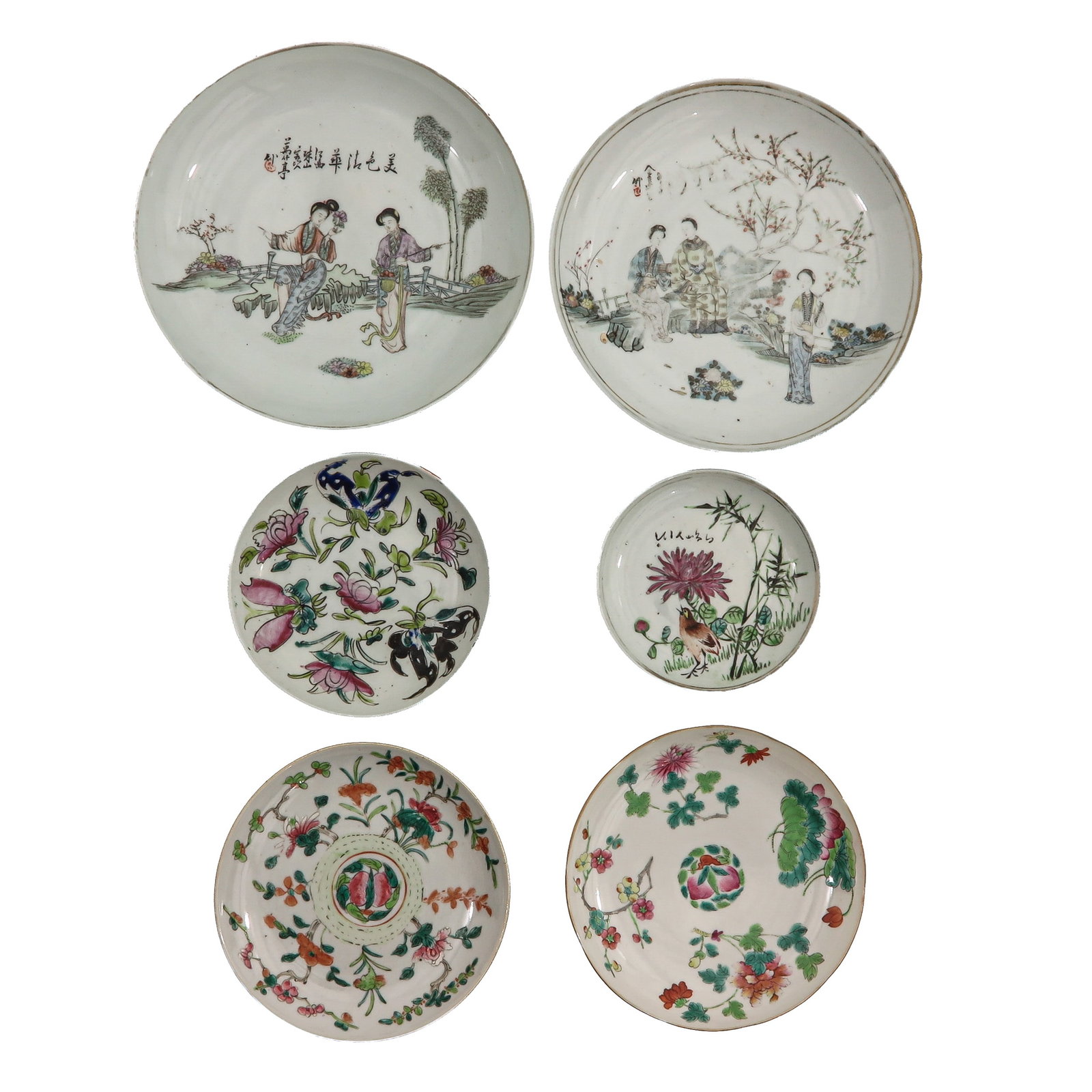A Group of Famille Rose Dishes: Variously decorated with flowers, butterflies, and birds and figural scenes, some with calligraphy, including 19th Century, largest plate is 24 cm. in diameter.