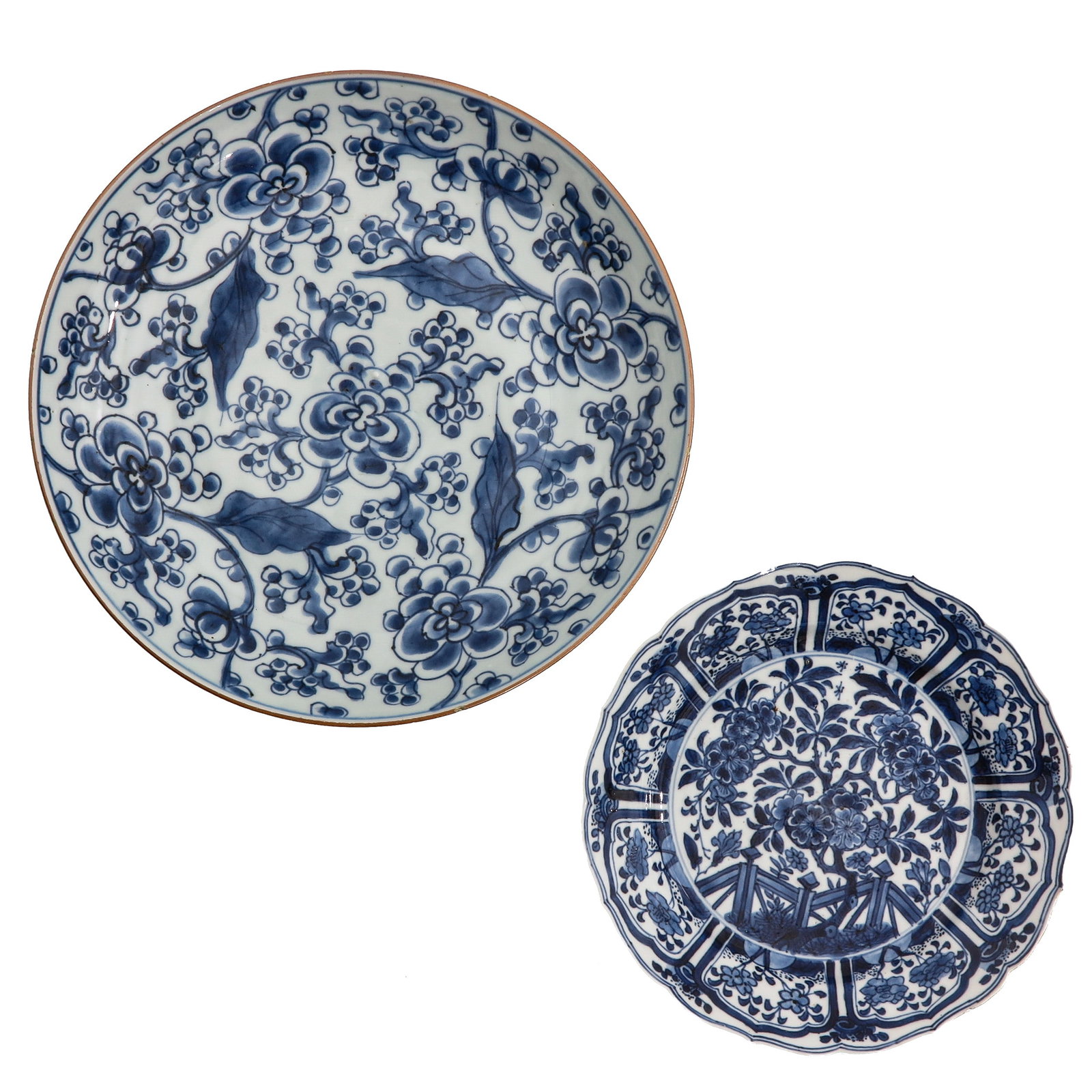 A Lot of 2 Blue and White Plates: Decorated with floral designs, 18th Century, largest plate is 28 cm. in diameter.