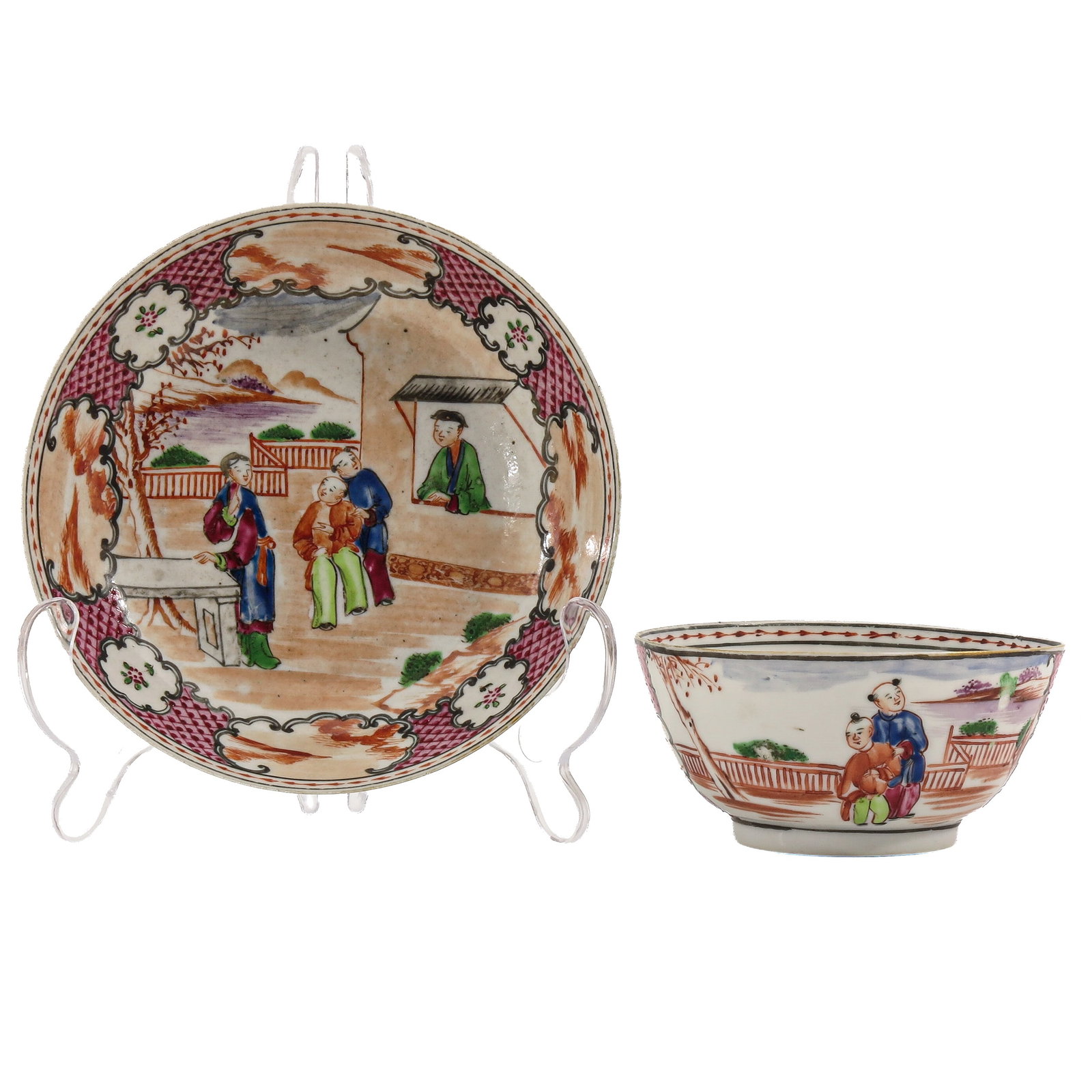 A Mandarin Cup and Saucer: Decorated in Famille Rose enamels with figural garden scenes, 18th Century, saucer is 15 cm. in diameter.