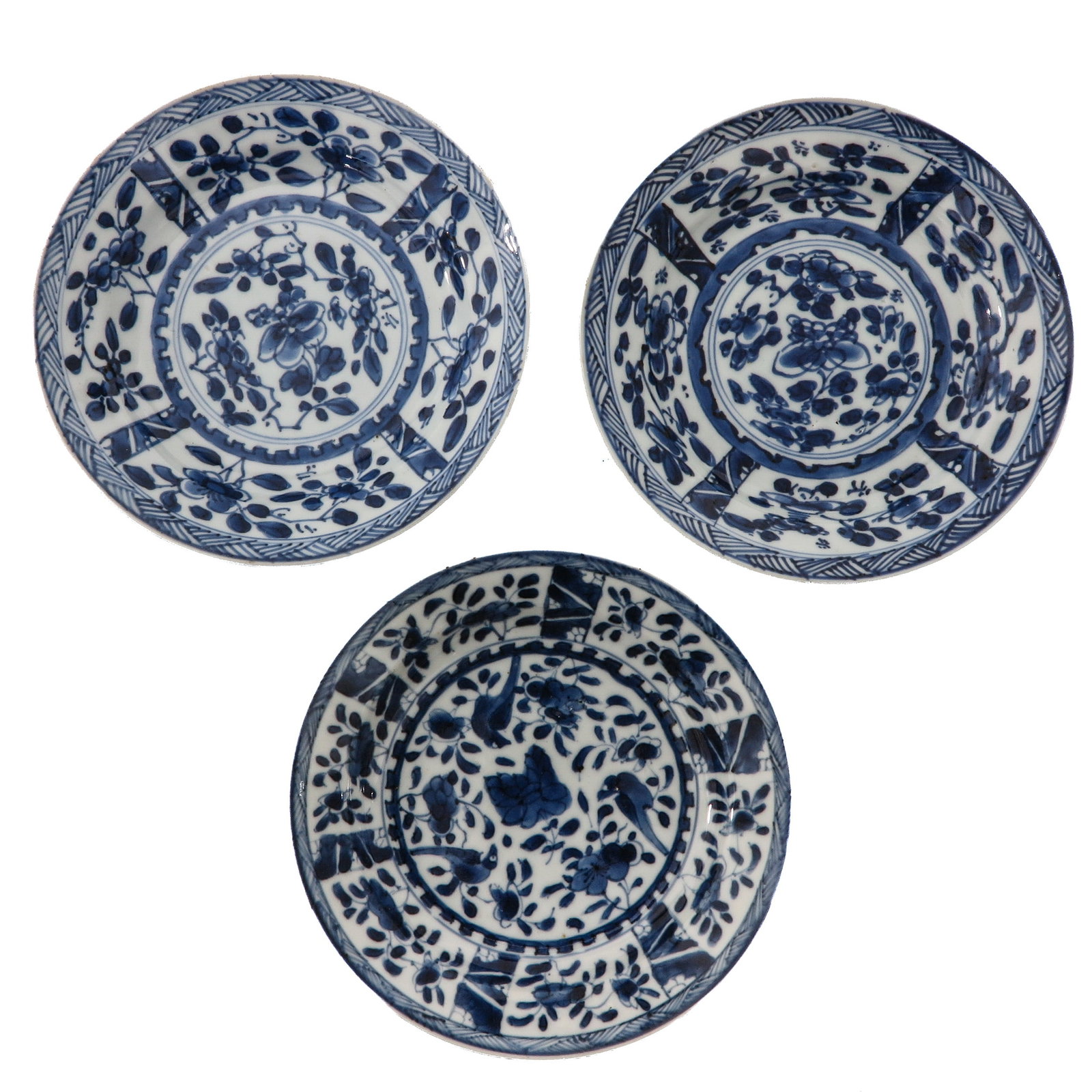 A Group of 3 Blue and White Plates: Decorated with flowering branches and birds, 18th Century, 16 cm. in diameter.
