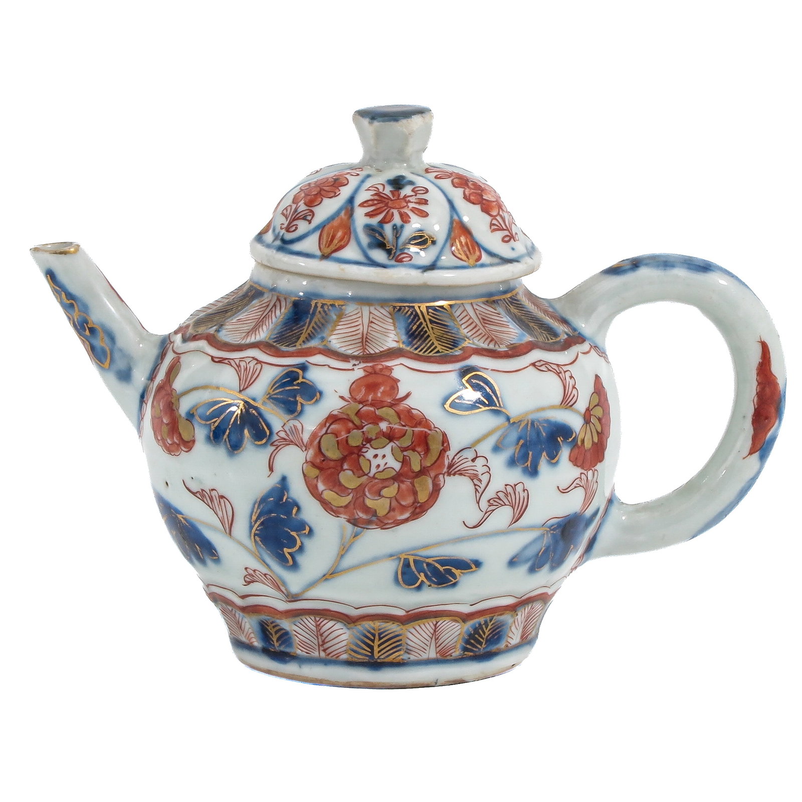 An Imari Teapot: Decorated with flowering peonies in underglaze blue, iron-red and gilt, 18th Century, 11 cm. tall.