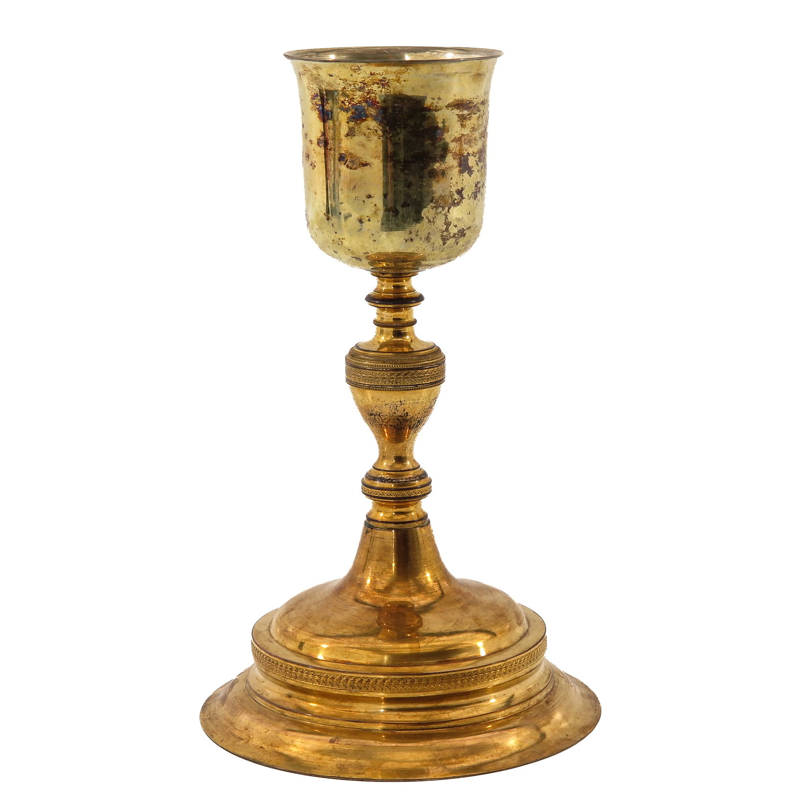 A Chalice: gilt brass, with silver cuppa, height 27 cm.