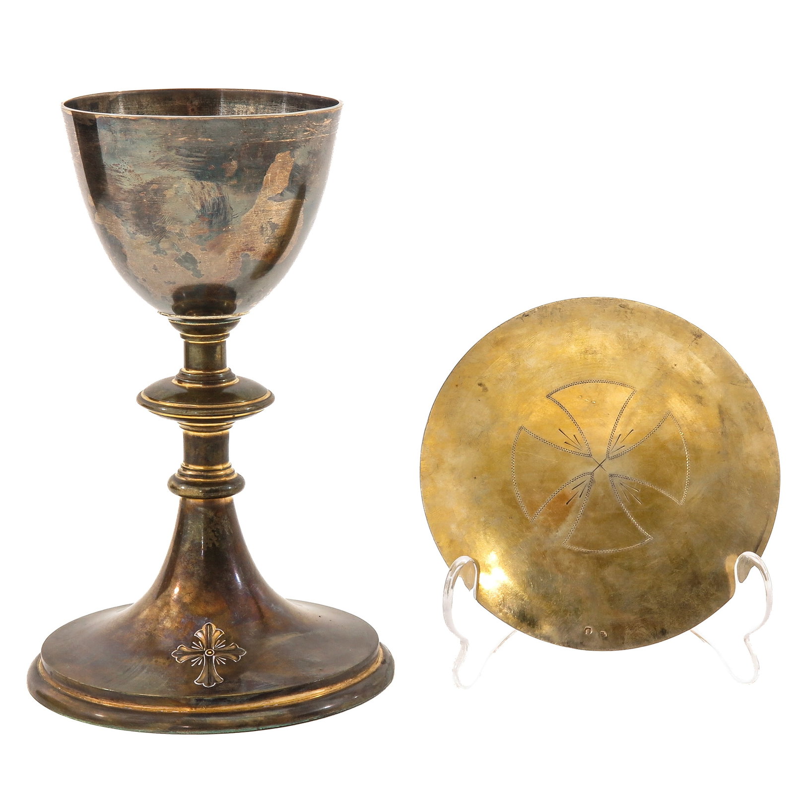 A Chalice: with silver cuppa and silver paten, decorated with a cross, in original box, height 20 cm.