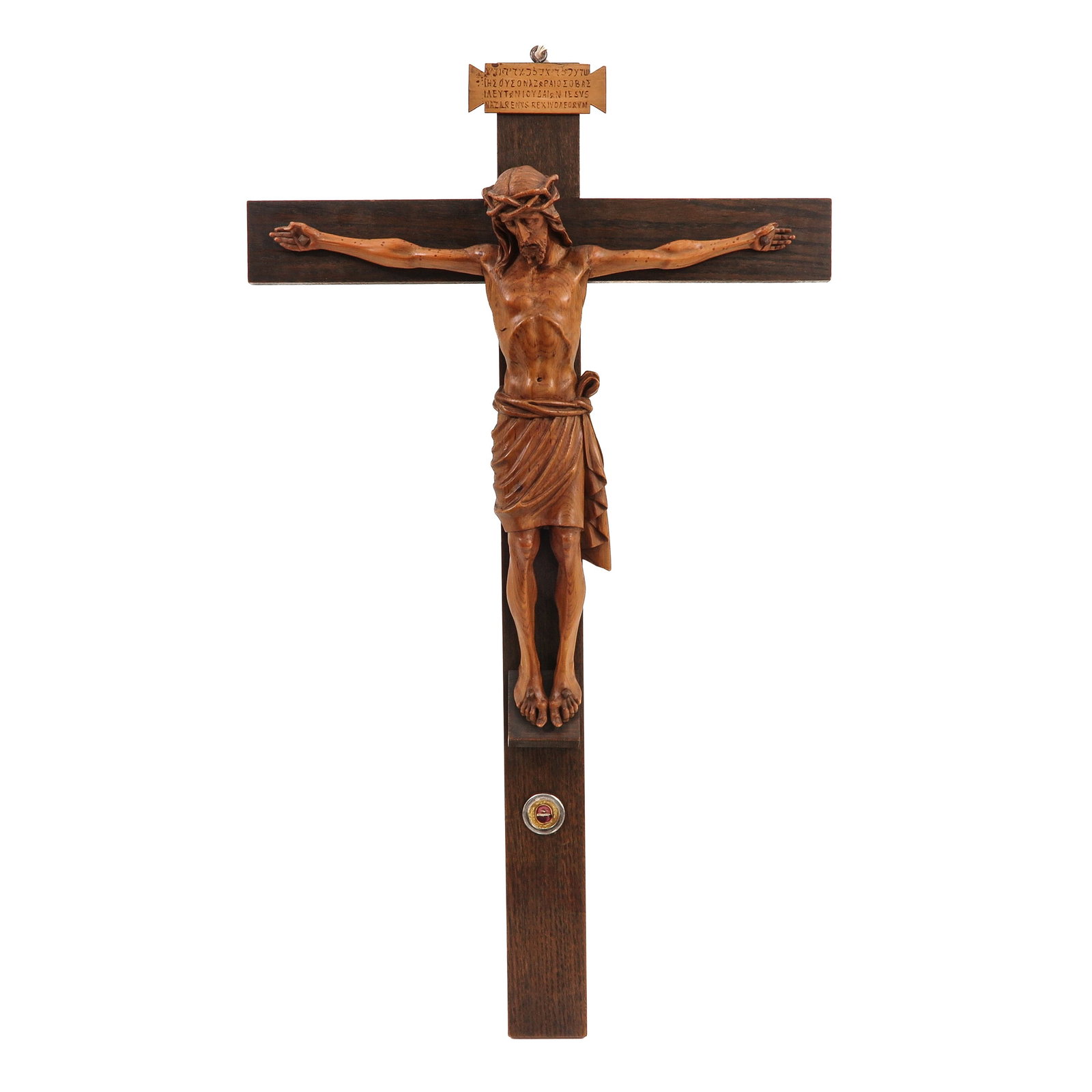 A Corpus Christi: on large wooden cross, with relic of the Holy Cross in a round theca, height 96 cm.