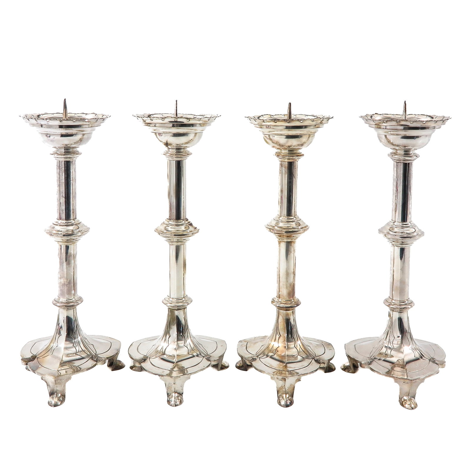 A Set of 4 Candlesticks: of 4 silver-plated candlesticks, height 48 cm.