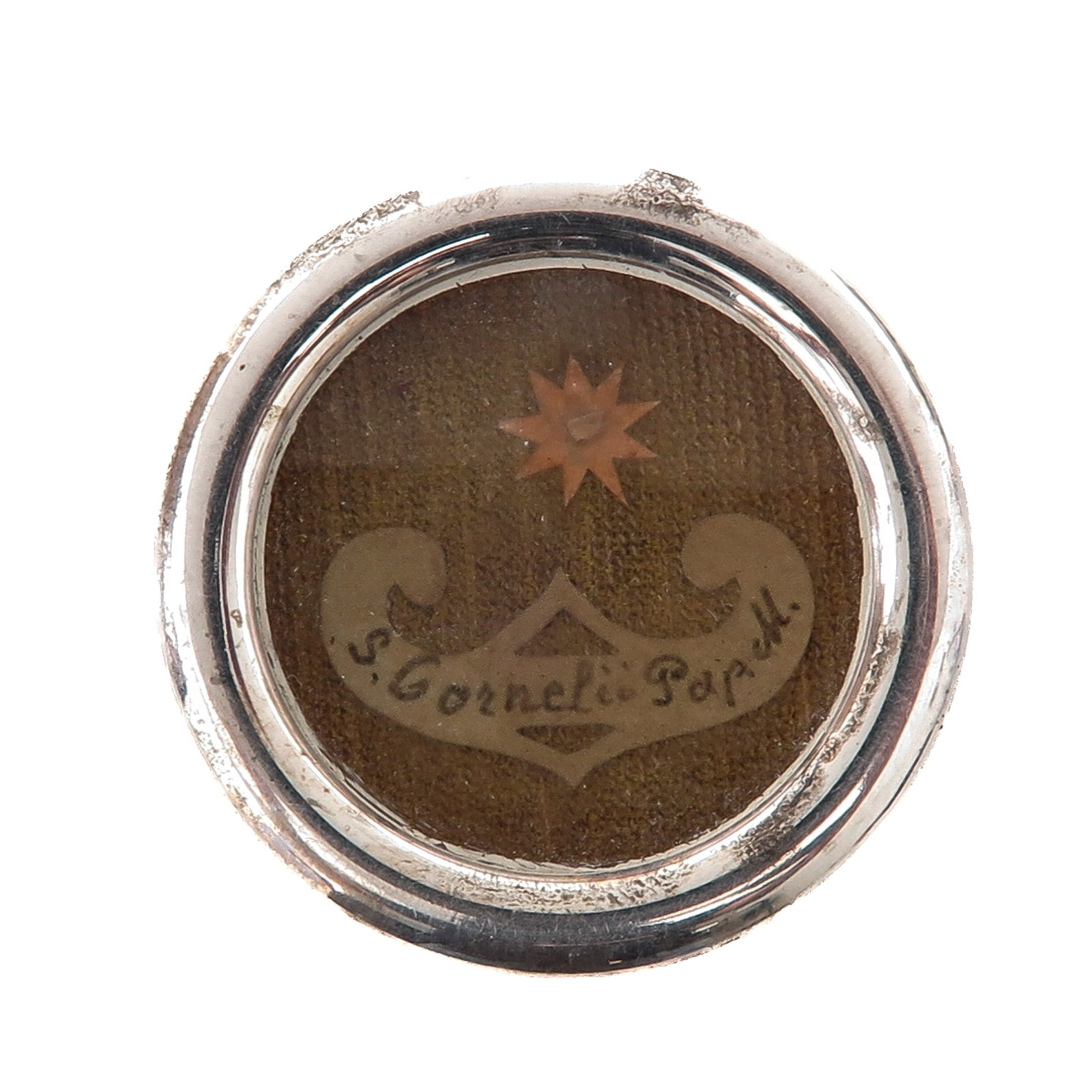 A Sealed Theca: with relic of Saint Cornelius, pope and martyr, venerated as patron saint of cattle and protection against epilepsy, with certificate, you are purchasing the theca, the relic is a gift, diameter 4 cm.