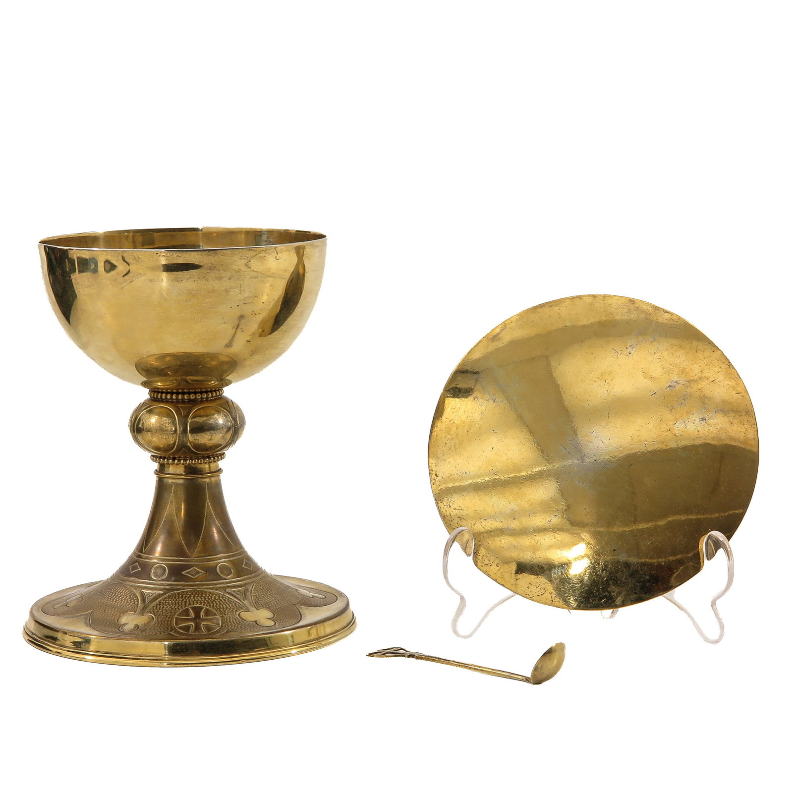 A Chalice: with silver cuppa, paten and spoon, in original box by C.H. de Vries, Amsterdam, height 16 cm.