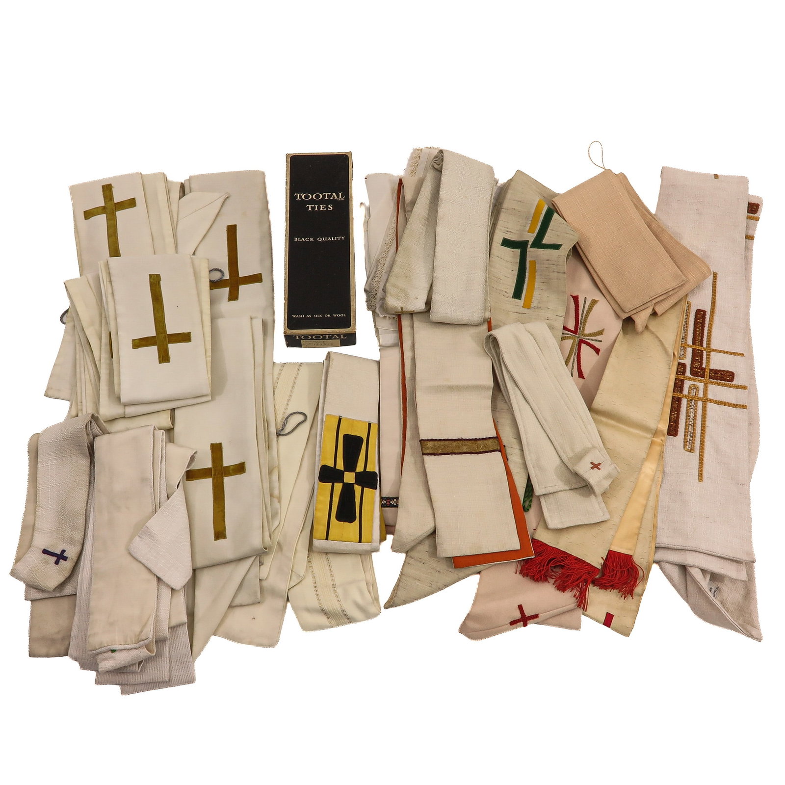 A Group of Liturgical Vestments: consisting of various liturgical vestments, including with depictions of crosses