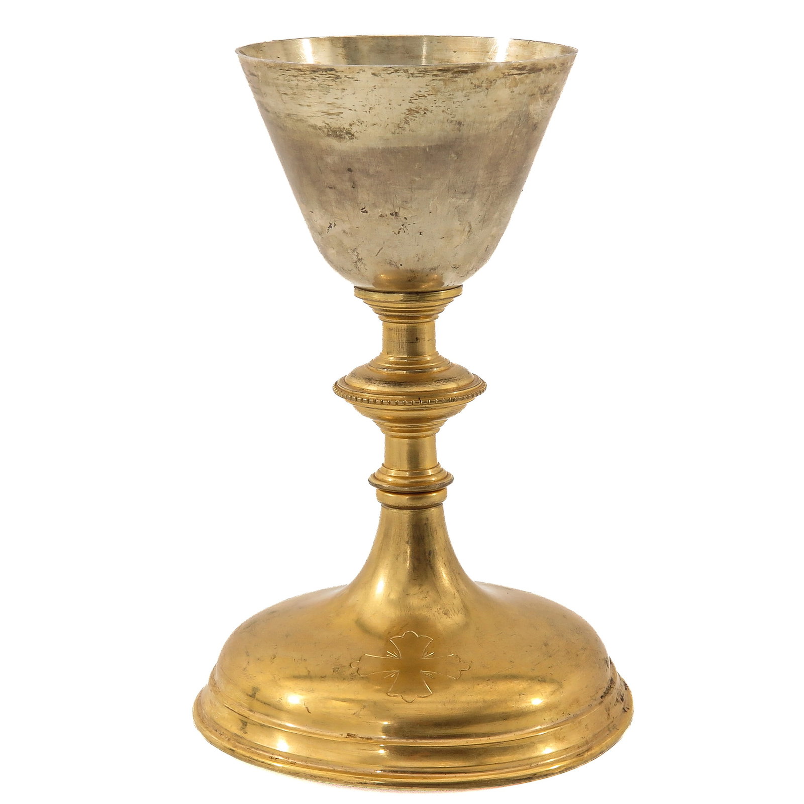 A Chalice: gilt brass, with silver cuppa, height 18 cm.