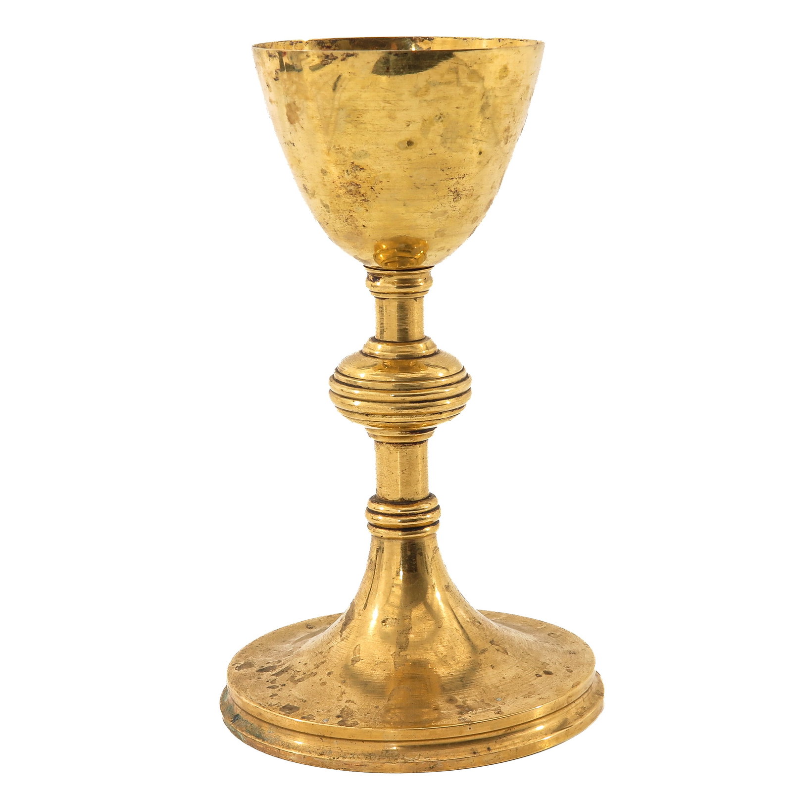 A Chalice: gilt brass, with silver cuppa, height 22 cm.