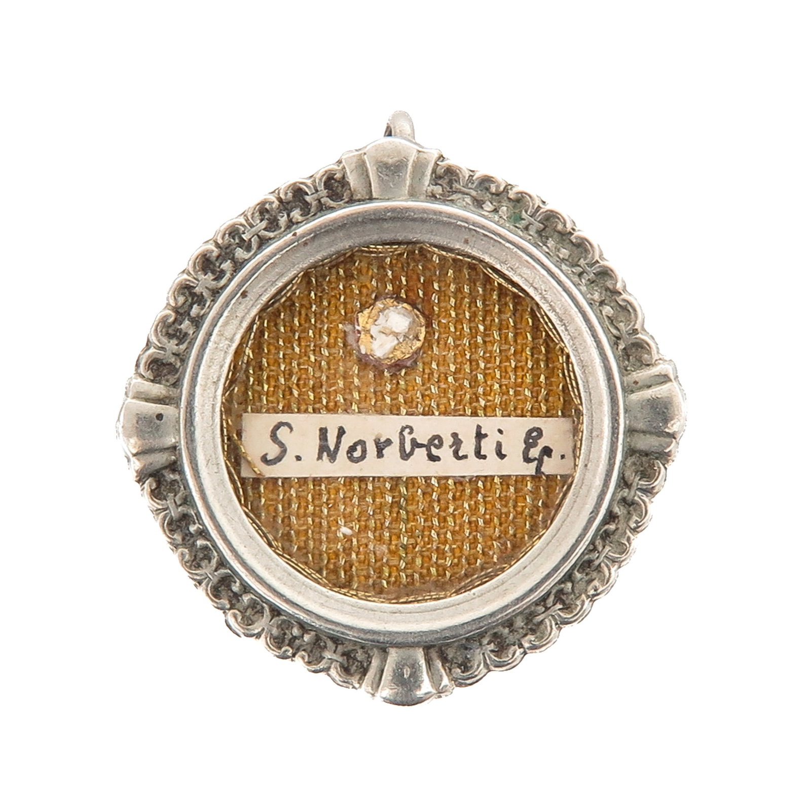 A Sealed Theca: containing relic of Saint Norbert, bishop and founder of the Norbertines, patron saint of peace, pregnant women and livestock, with certificate, diameter 2 cm., you are purchasing the theca, the