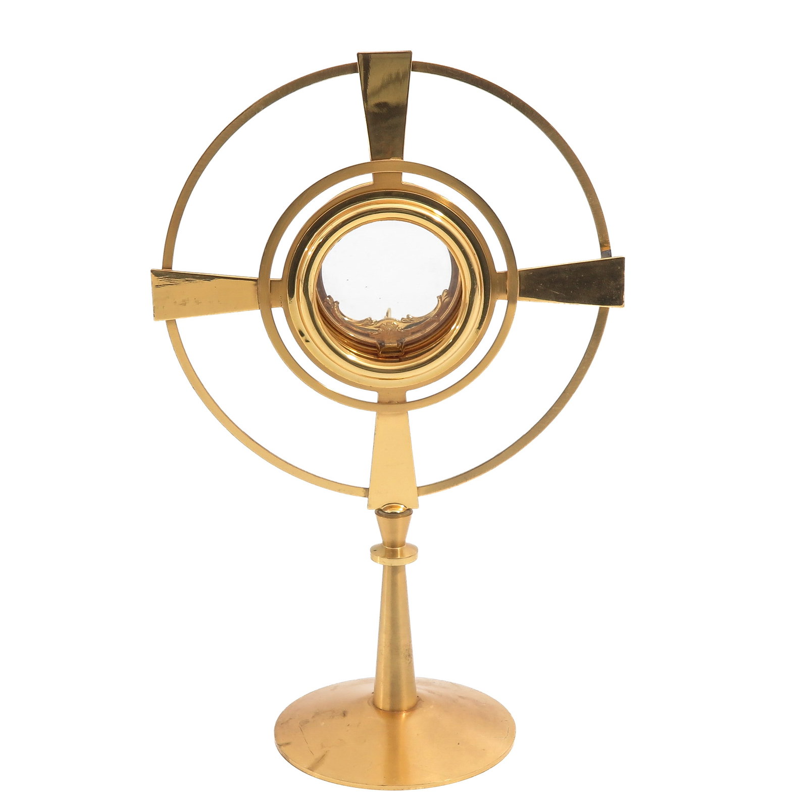 A Monstrance: gilt brass, with circular design, with luna, height 34 cm.