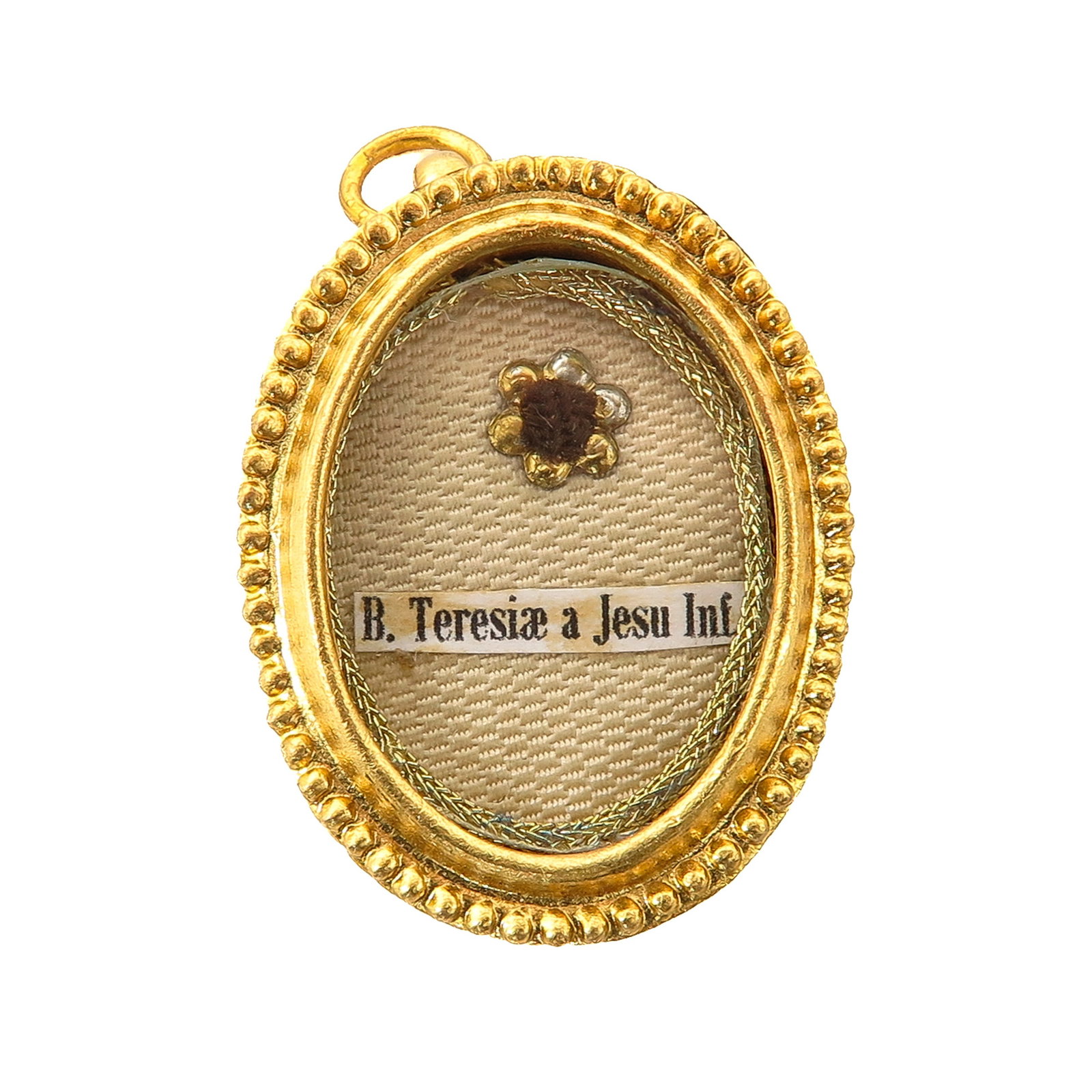 A Sealed Theca: with relic of Blessed Therese of the Child Jesus, Carmelite, Doctor of the Church and patron saint of the missions, known for her little way of simplicity, love and trust in God, you are purchasing