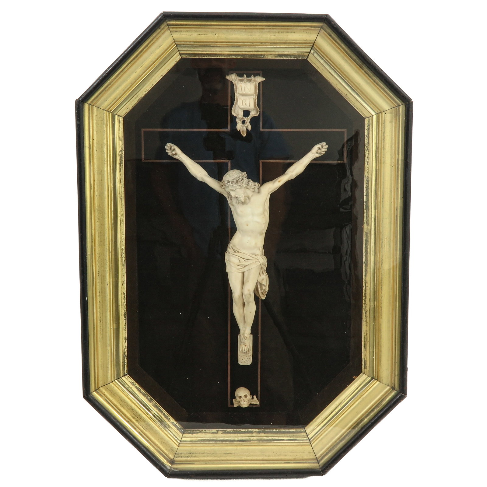 A Corpus: of Christ on the cross, terracotta, in hanging display case, 57 x 10 x 80 cm.