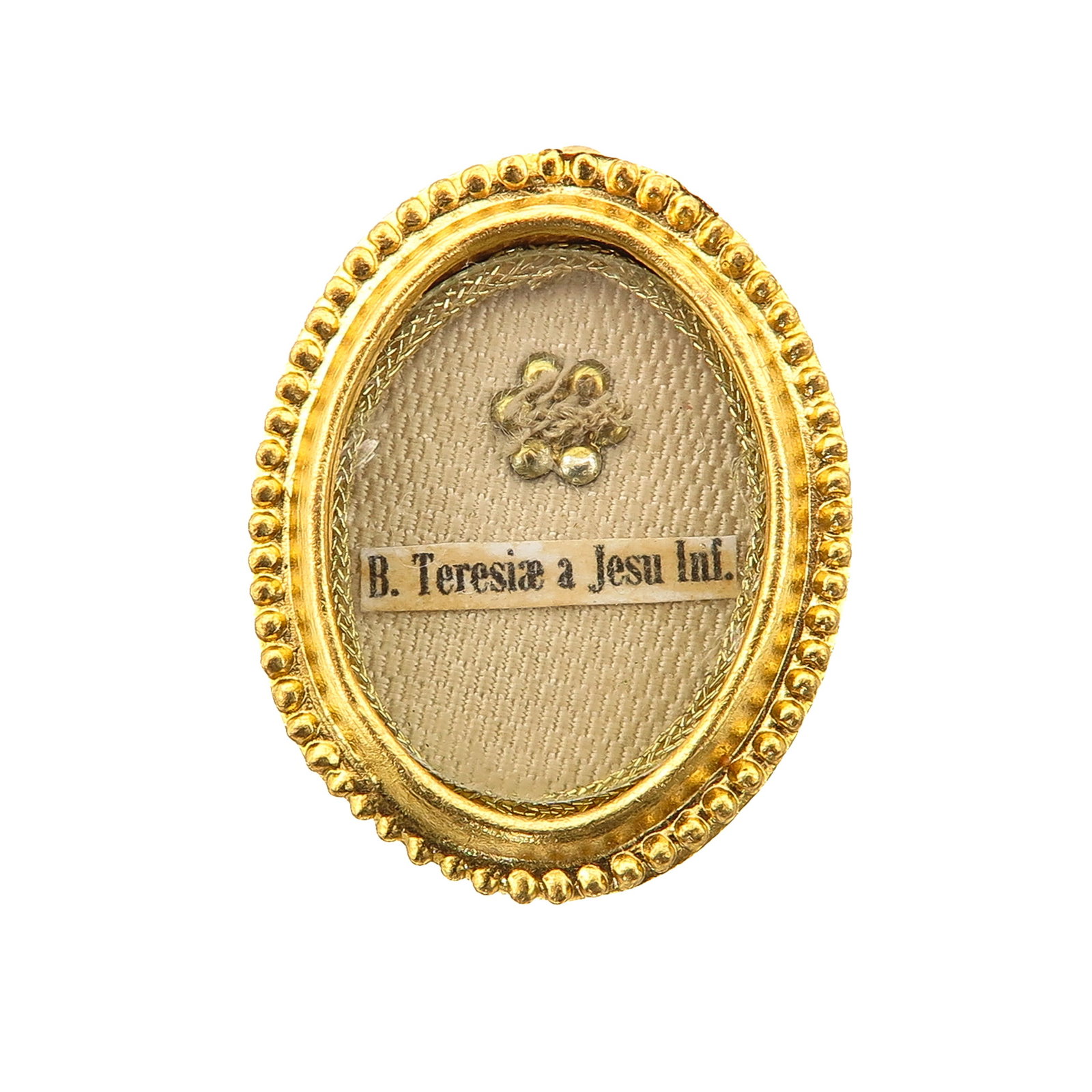 A Sealed Theca: with relic of Blessed Therese of the Child Jesus, Carmelite, Doctor of the Church and patron saint of the missions, known for her little way of simplicity, love and trust in God, you are purchasing