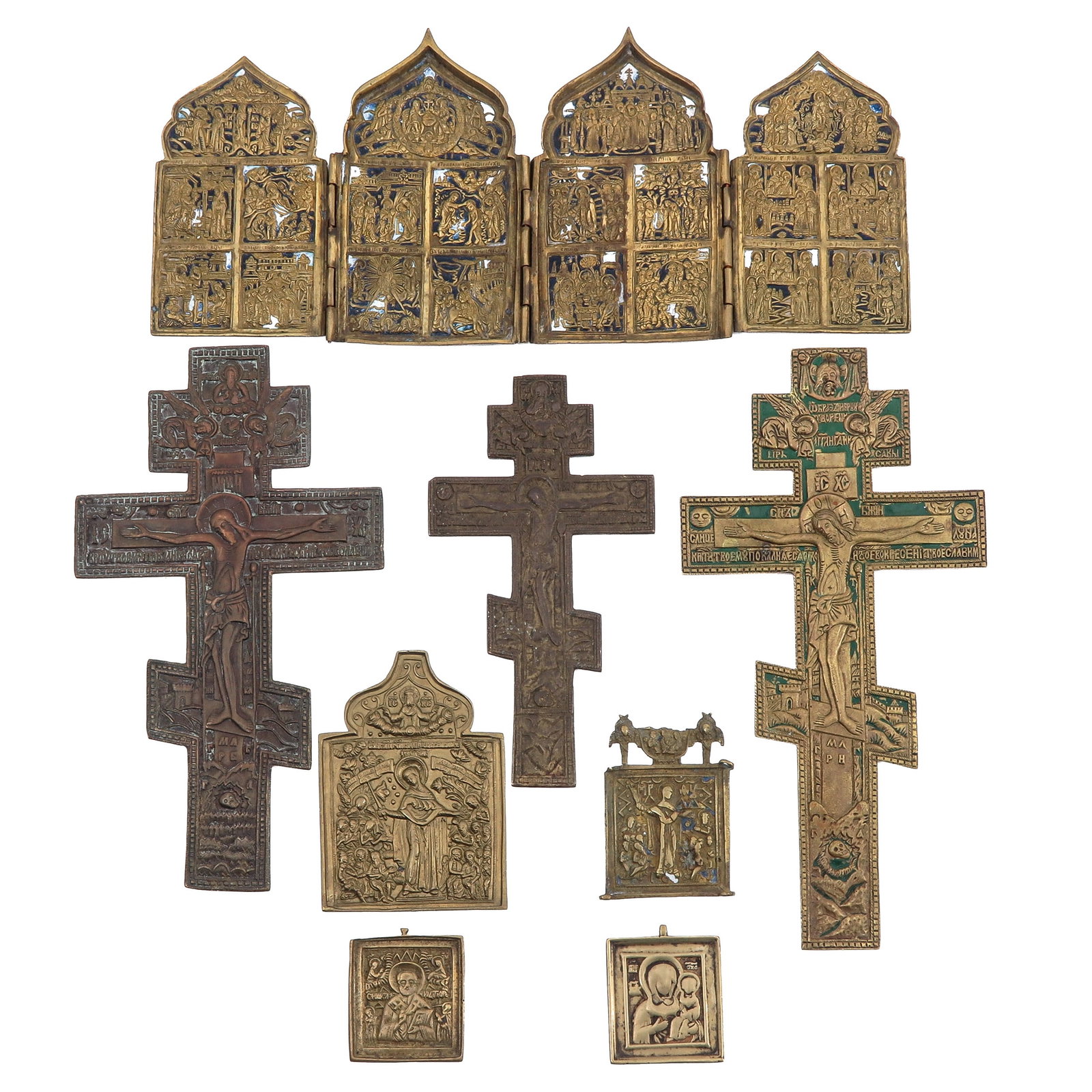 A Group of Bronze Travelling Icons: consisting of a collection of Russian bronze travelling icons, partly enamelled, largest 35 x 15 cm.