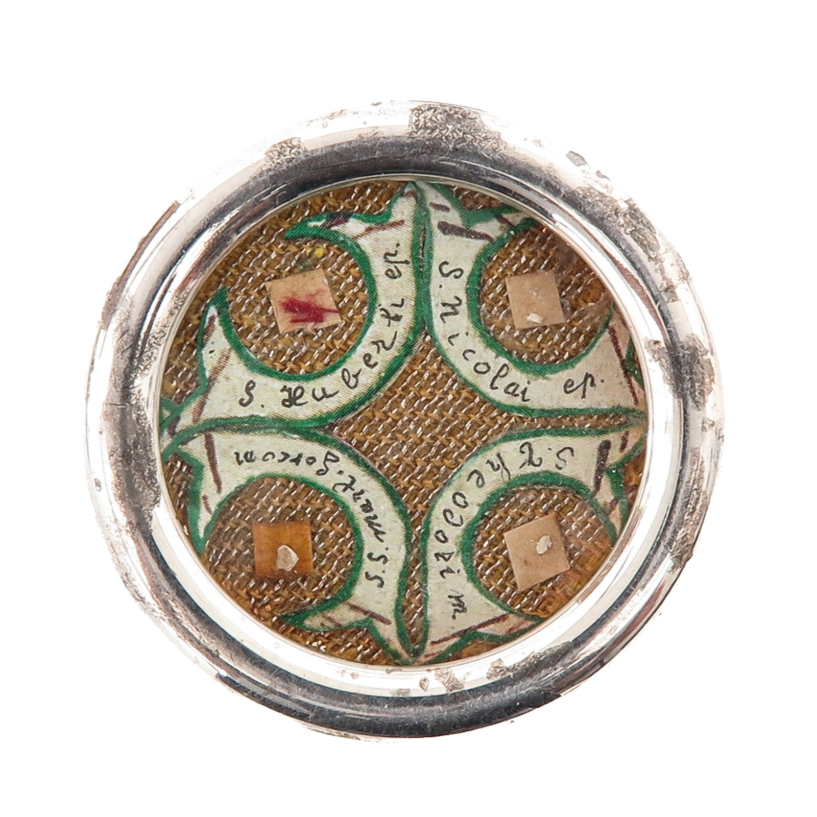 A Sealed Multi-Theca: with relics of Saint Huberti Ep., bishop, Saint Nicholas, bishop, Saint Theodore, martyr, and the Martyrs of Gorkum, with certificate, you are purchasing the theca, the relic is a gift, diameter 4 cm.