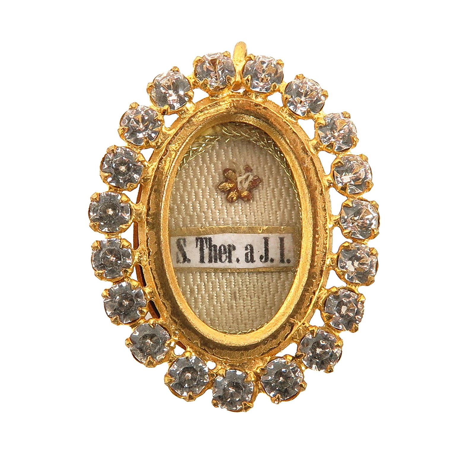 A Sealed Theca: set with rhinestones, with relic of Blessed Th?rse of the Child Jesus, Carmelite, Doctor of the Church and patron saint of the missions, known for her little way of simplicity, love and trust in God,