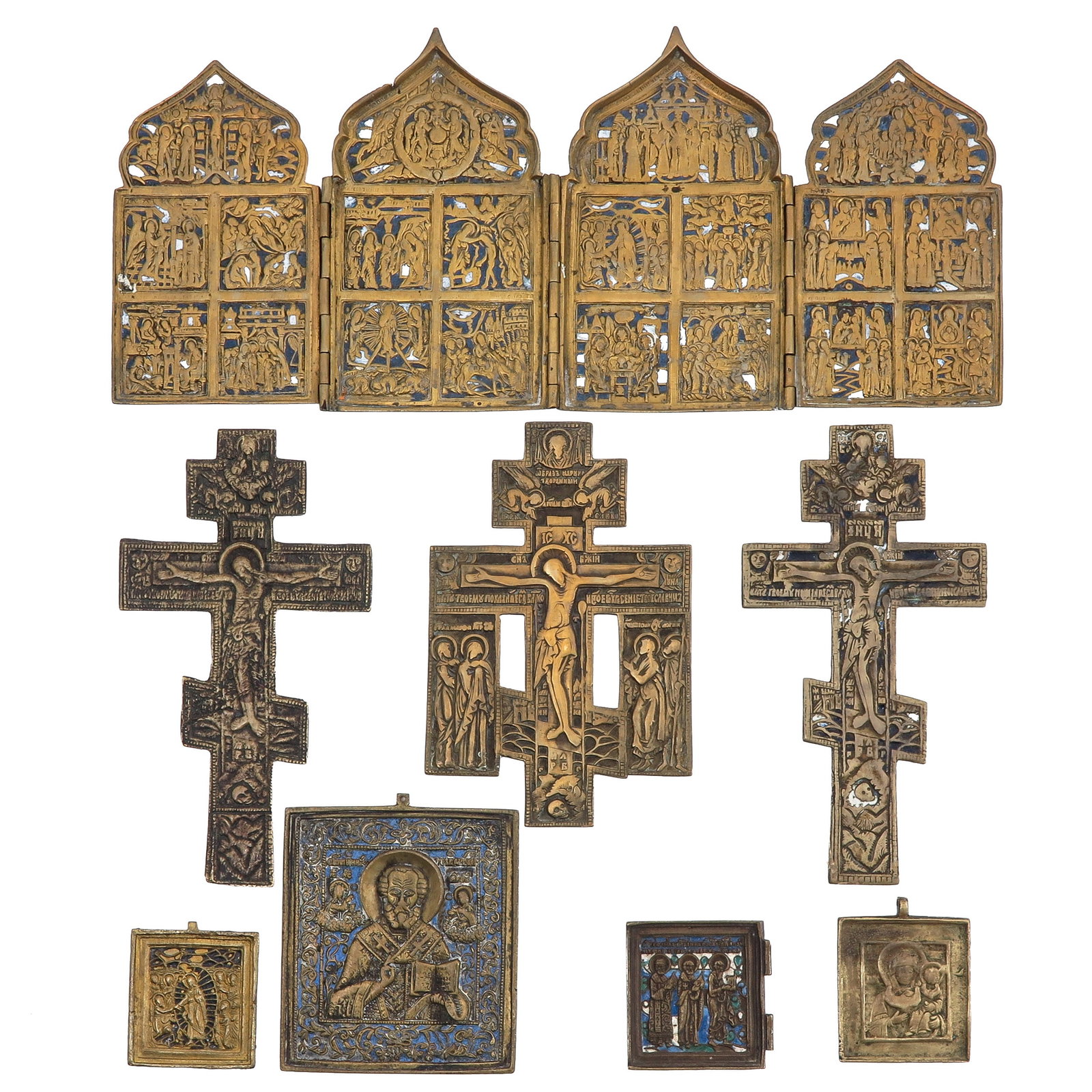 A Group of Bronze Travelling Icons: consisting of a collection of Russian bronze travelling icons, partly enamelled, largest 37 x 16 cm.
