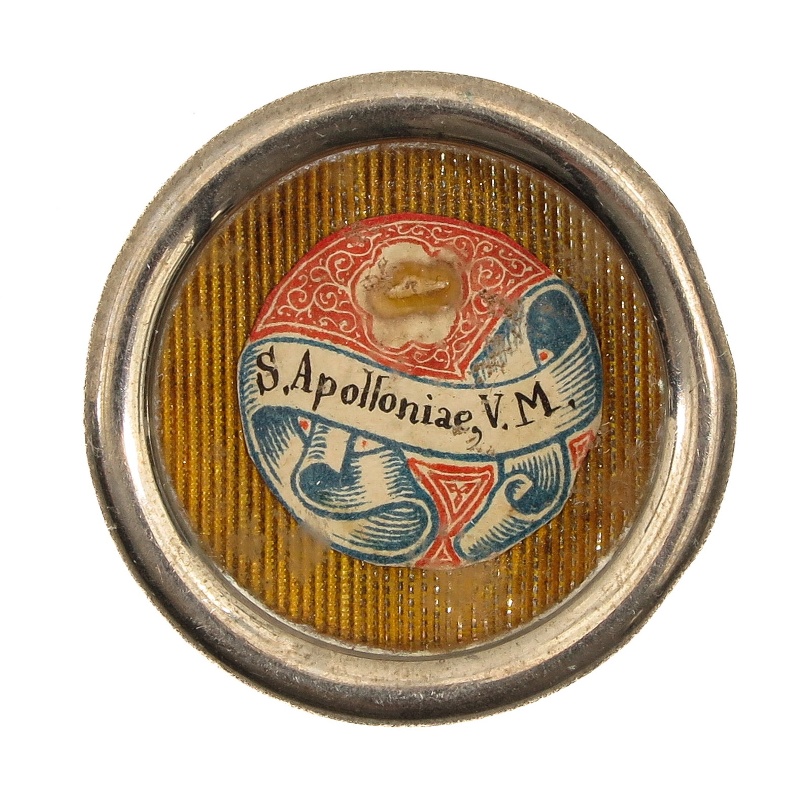 A Sealed Theca: containing relic of Saint Apollonia of Alexandria, virgin and martyr, patron saint of dentists, you are purchasing the theca, the relic is a gift, diameter 4 cm.