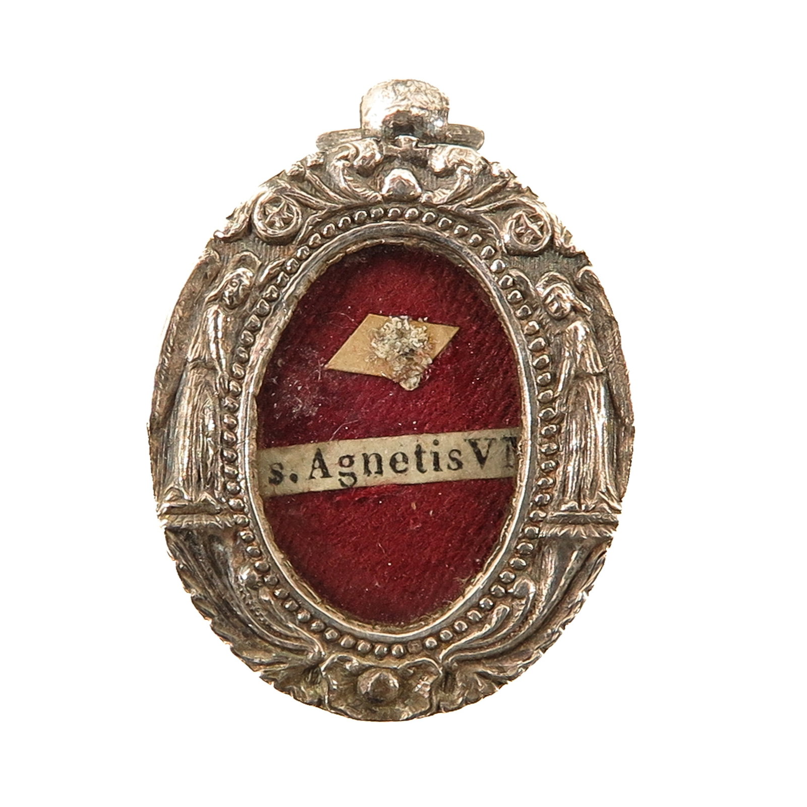 A Sealed Theca: silver, executed with a richly decorated border with 2 standing saint figures, the theca contains a relic of Saint Agnes of Rome (ca. 291-304), virgin martyr and patron saint of among others young