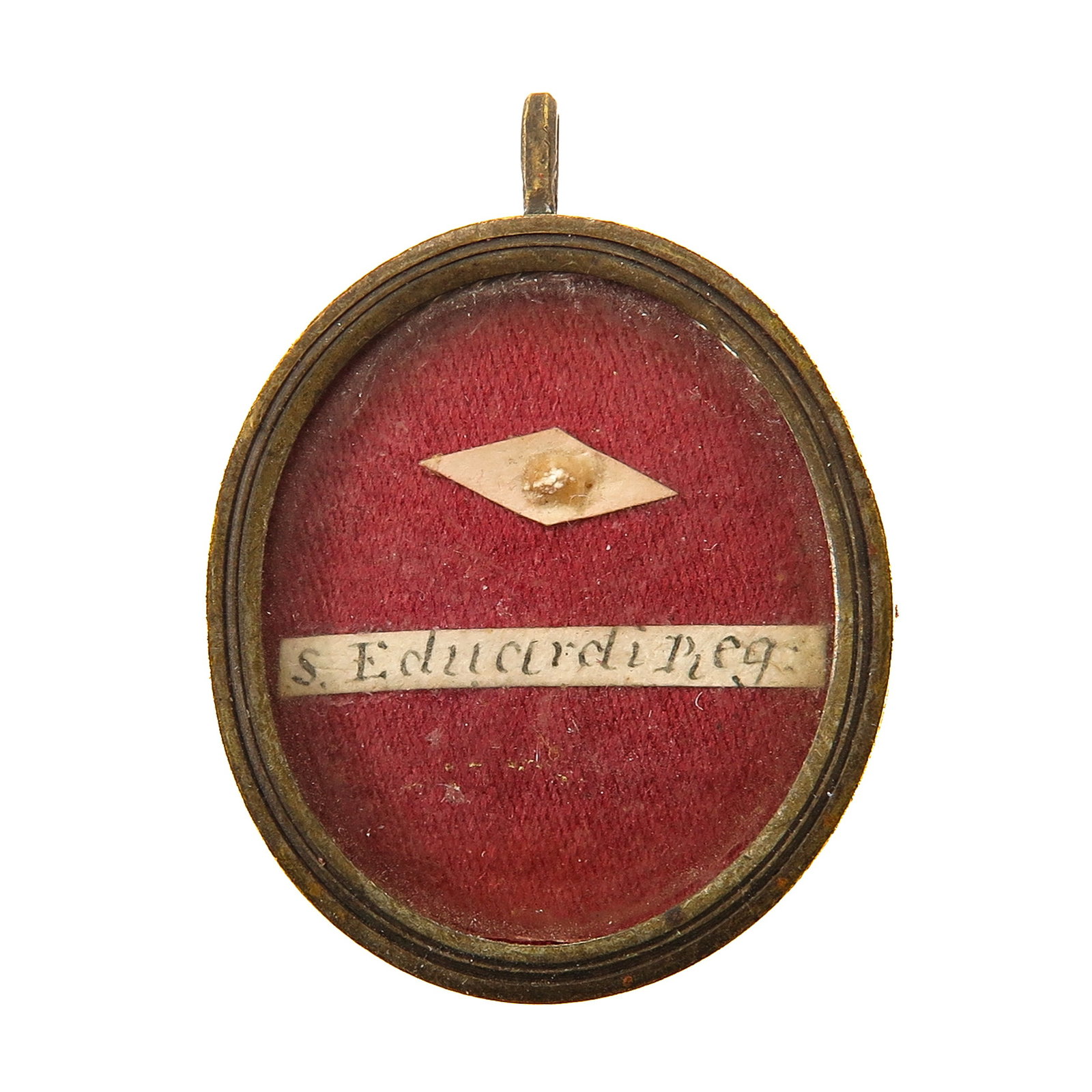 A Sealed Theca: containing relic of Saint Edward the Confessor, King of England and patron saint of kings and difficult marriages, you are purchasing the theca, the relic is a gift, 3 x 4 cm.