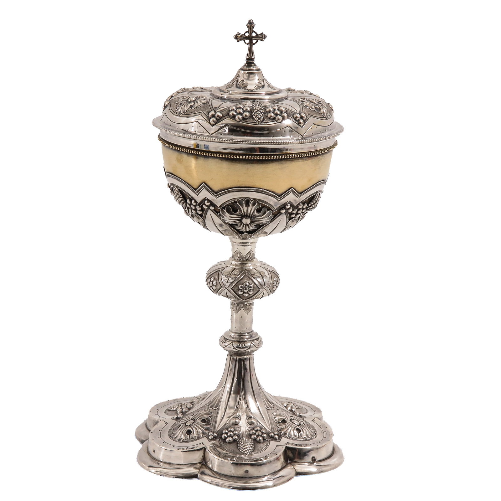 A Ciborium: hallmarked with Belgian silver hallmarks, richly decorated with grape clusters and floral motifs, partly gilt, height 28 cm.