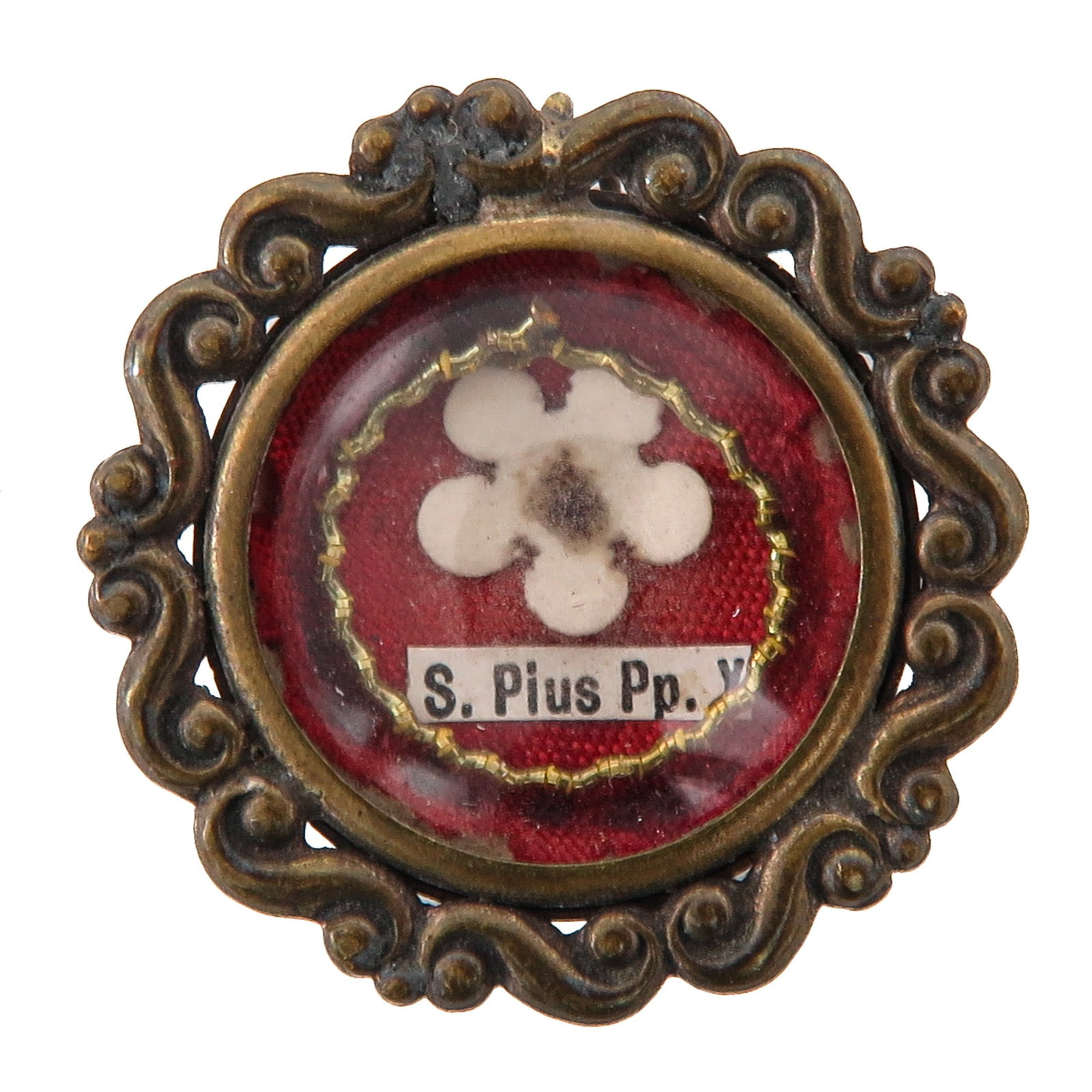 A Sealed Theca: in a pierced brass mount, containing relic of Saint Pius V (1504-1572), pope patron of the Dominican Order, the rosary and the papal liturgy, you are purchasing the theca, the relic is a gift,