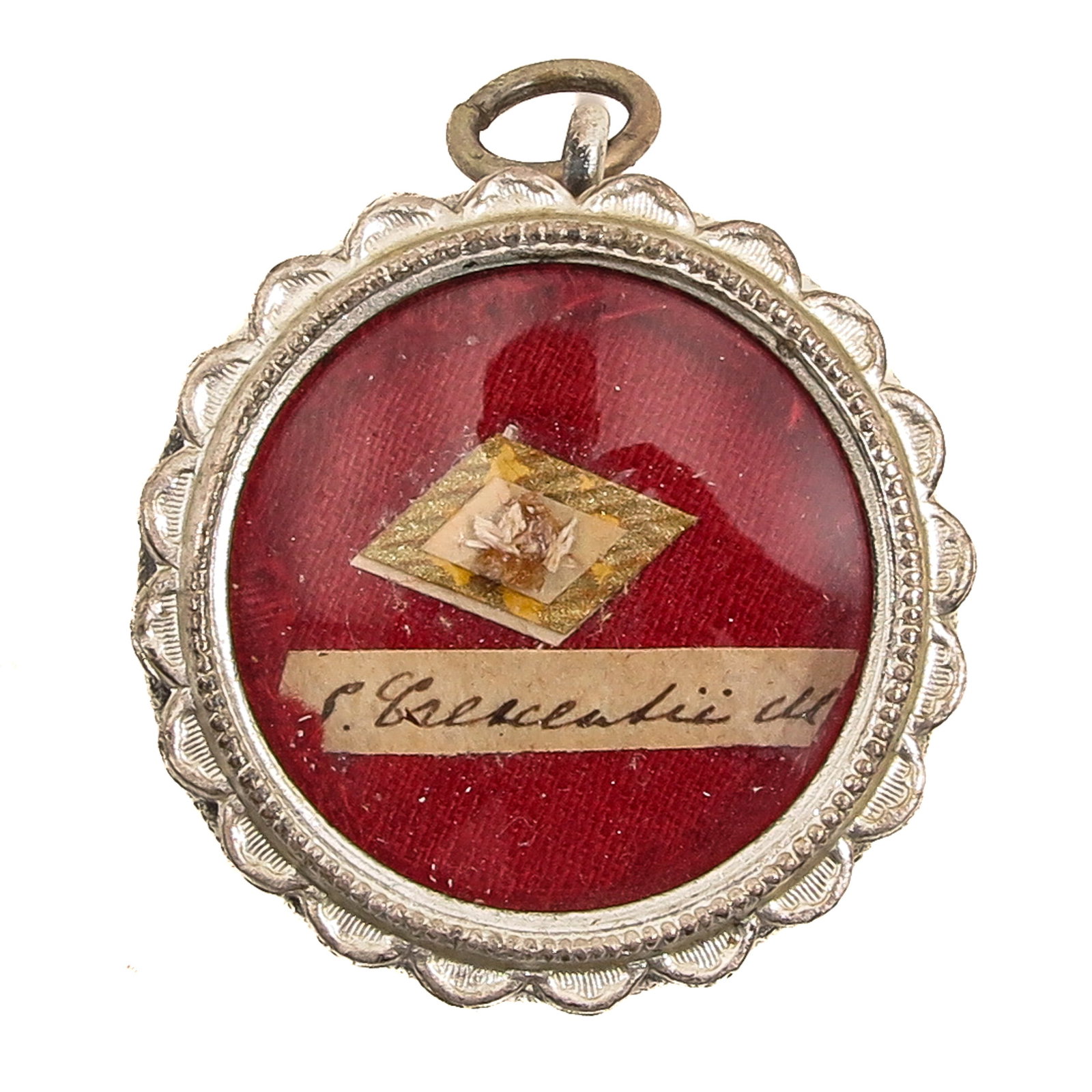 A Sealed Theca: containing relic of a saint, you are purchasing the theca, the relic is a gift, diameter 2 cm.