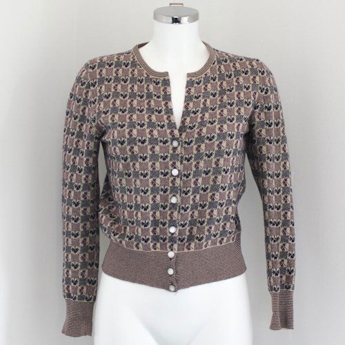 Chanel Ladies Sweater: Purple and blue in color with mother of pearl buttons