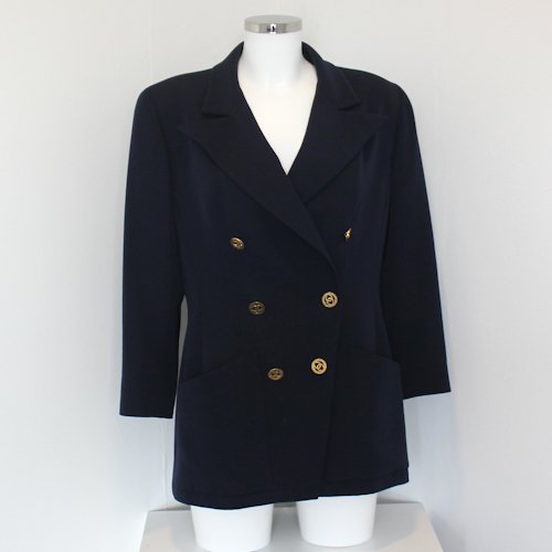 Chanel Classic Ladies Blazer: Dark blue in colour with CC logo button closures. Size 42