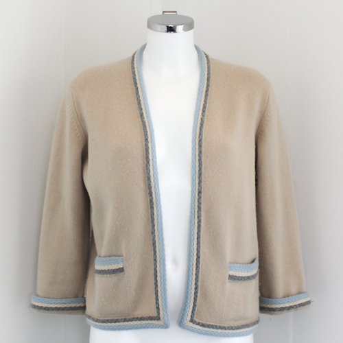 Chanel Ladies Cashmere Sweater: Cream in colour with light blue accents and double pockets in front. Size 42