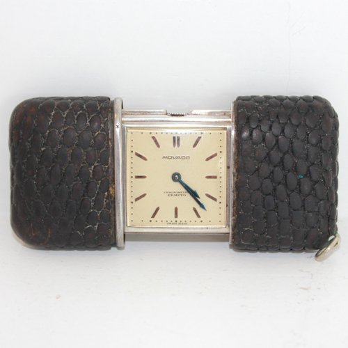 Movado Watch: sterling silver case with snakeskin band, 8 x 1 x 4 cm